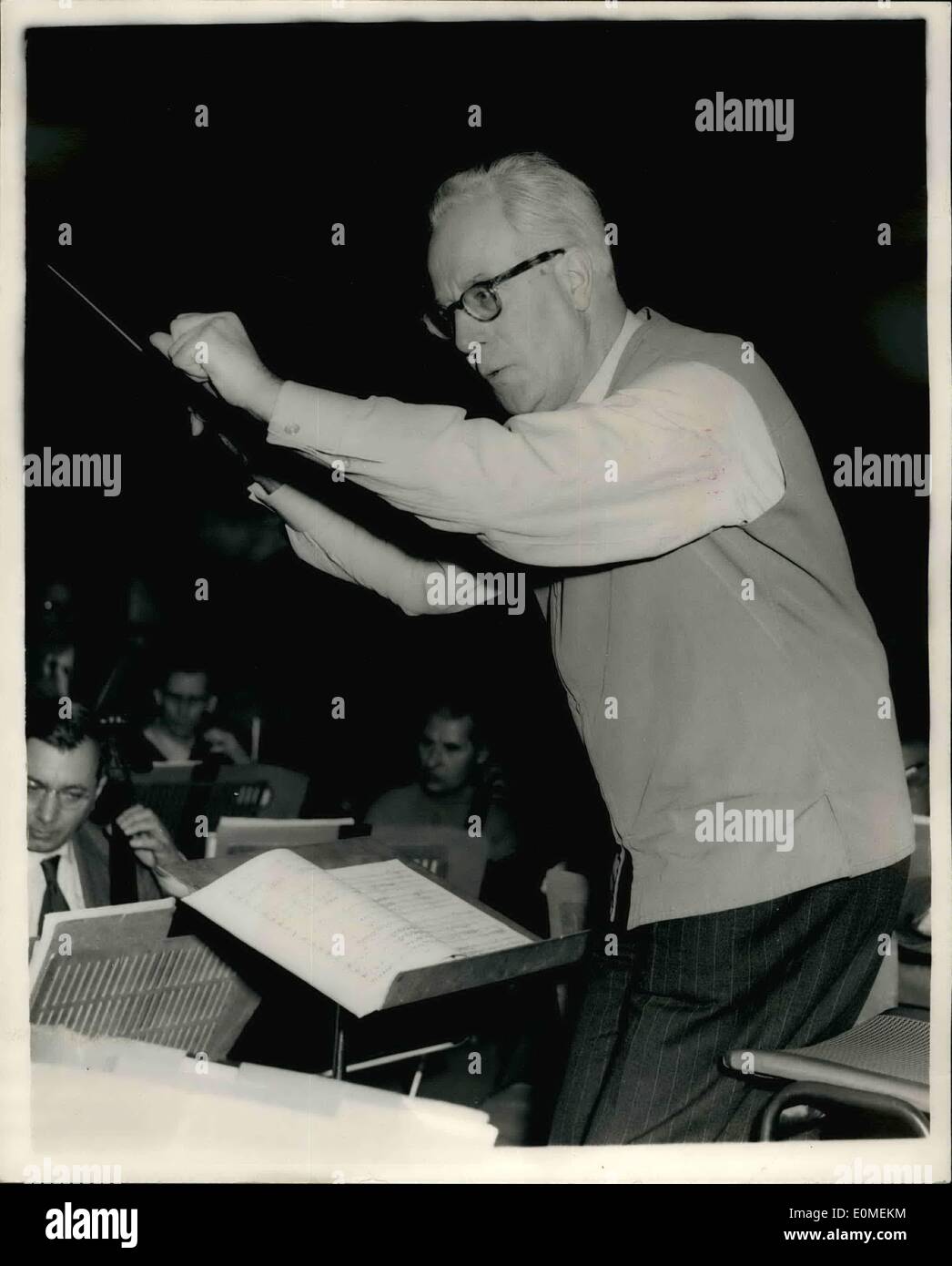 Feb. 02, 1955 - Musicians From Bavaria - At Festival Hall. Rehearsal In Progress: The symphony Orchestra of Bavaria Radio more than 100 strong - is in London for the start of an extensive tour of the country. The Orchestra ranks only second in Germany - after the famous Berlin Philharmonic Orchestra.. Photo Shows: Professor Eugen Jochum conducts the orchestra - during a rehearsal at the festival hall this morning. Stock Photo