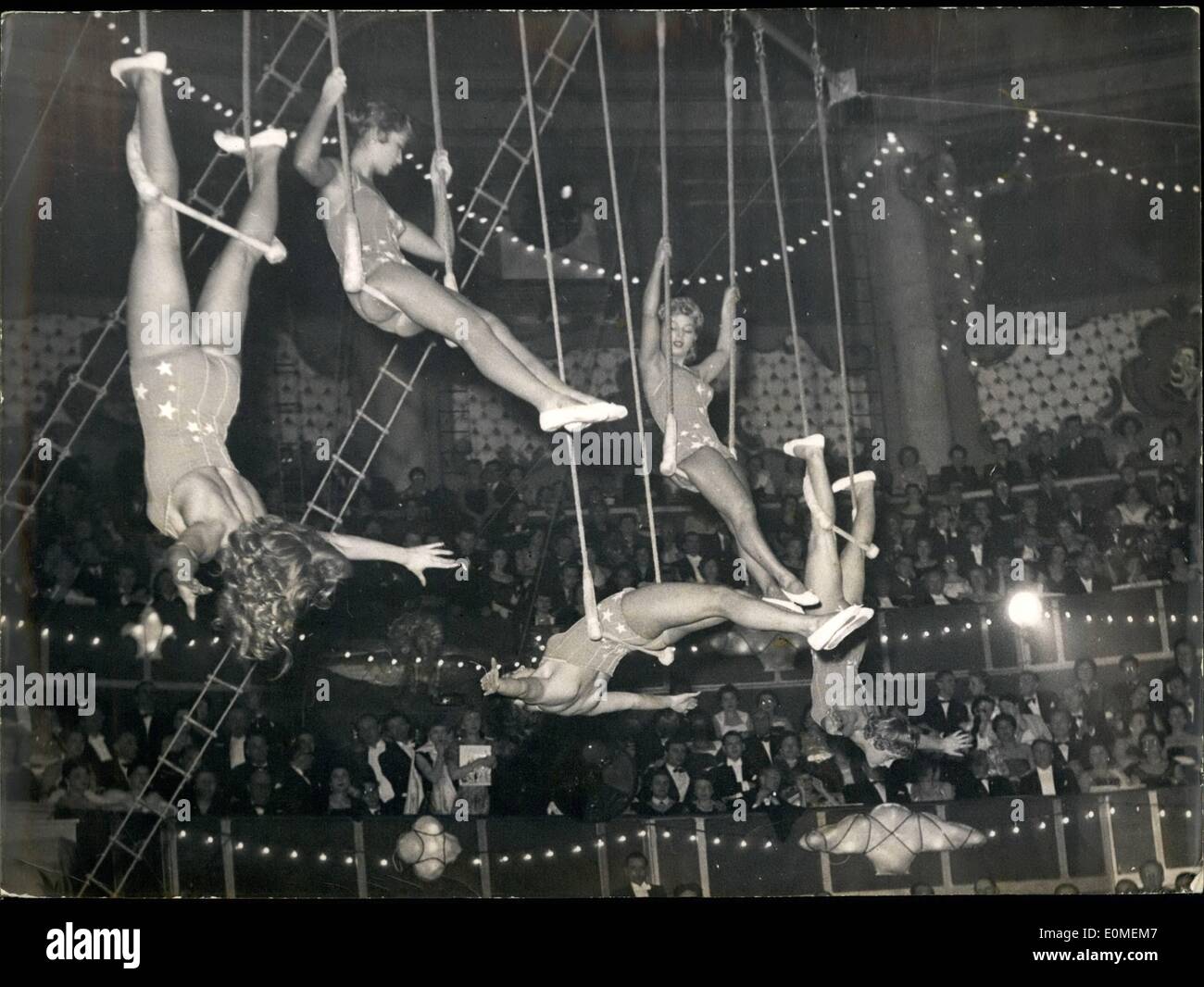 Feb. 02, 1955 - Charity Gala Show In Aid Of Needy Artists: Girl artists in a flying Trapeze numbers on one of the items of the Brilliant Programmes staged by Paris artists in aid of their their needy comrades at the Cirque D'Hiver Paris, last night. Stock Photo