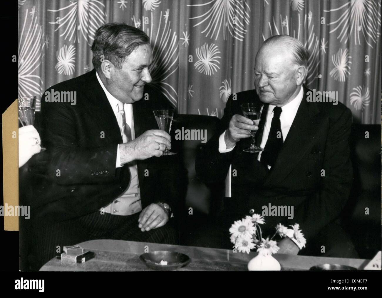 Nov. 25, 1954 - German Federal Vice President Carlo Schmid toasts US  ex-President Herbert Hoover, who is currently on a state visit in Germany.  Hoover gained popularity throughout Germany with his aid