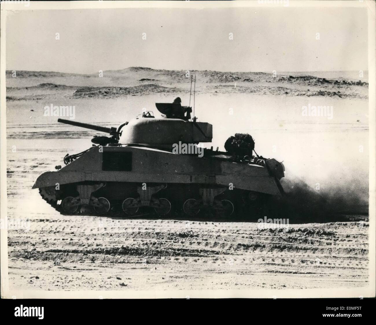 Dec. 12, 1954 - Prime minister of Egypt attends desert manoeuvrings a tank in action. photo shows A heavy in action - during the Manoeuvrings of the Egyptian forces in the desert - west of Cairo recently. The maneuvers were attended by prime minister gamel abdul Nasser - and other members of the Revolutionary council. Stock Photo