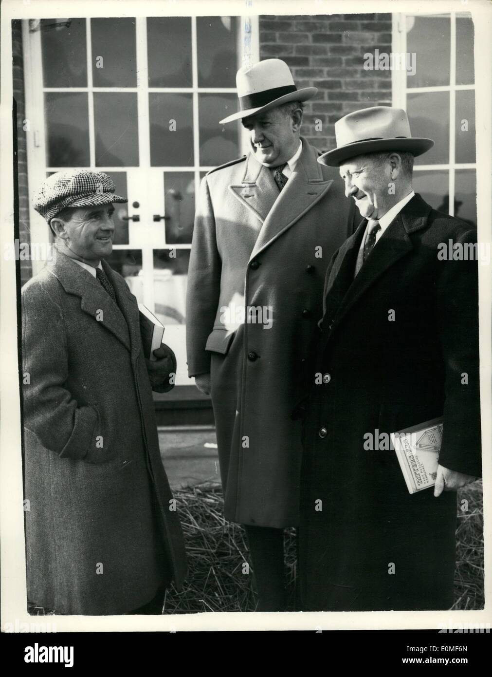 Dec. 12, 1954 - Opening of the Newmarket sales, Sir Gordon with visitors from the United States. A number of record prices were paid at the Newmarket Bloodstock Sales which opened at Newmarket this morning. Keystone Photo Shows: Sir Gordon Richards chatting to (centre) Mr. Joseph T. Donahue of New York, a well known racehorse owner and on right, Mr. James W. Smith also of New York, an ex-jockey and trainer at the sales today. JSS/Keystone Stock Photo