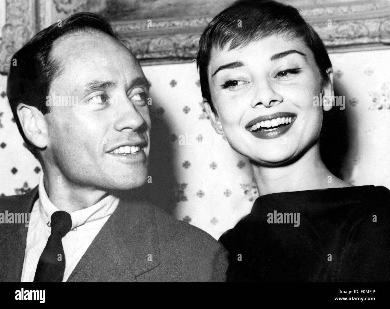 Actress Audrey Hepburn with husband Mel Ferrer visiting London Stock Photo