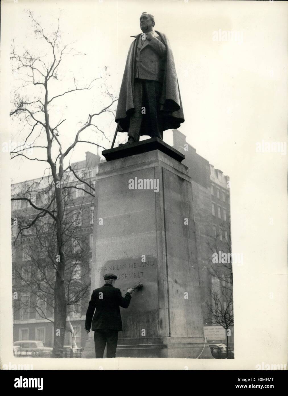 Mar. 03, 1955 - ''Traitor of Yalta'' On Roosevelt Statue... Workmen were removing the words ''Traitor of Yalta'' scrawled in letters a foot high in red paint on the base of the statue of President Roosevelt in Grosvenor Square.. It had been done during the night - and was reported to the police by staff of the American Embassy... Keystone Photo Shows: Workmen cleaning the wording off the statue in Grosvenor Square. Stock Photo