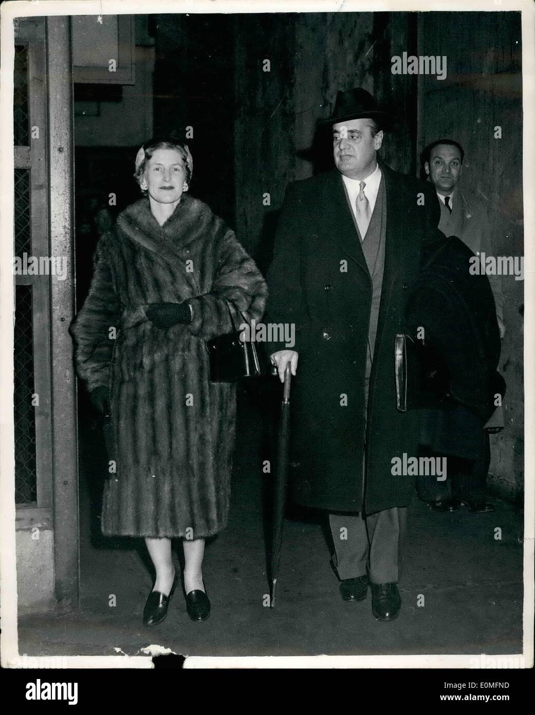 Mar. 03, 1955 - Frau Schlitter returns to London. German Government apologised for her Speech.: Frau Daisy Schlitter and her husband German Diplomant Herr Oskar Schlitter - returned to London last night from West Germany . They were recalled to Germany after a speech by Frau Schlitter in London at Christmas - and the West German Government apologised to Britain for the remarks made by Frau Daisy. They were met by their son Alexander and daughter Marion who remained in London when the diplomat and his wife returned to Germany Stock Photo