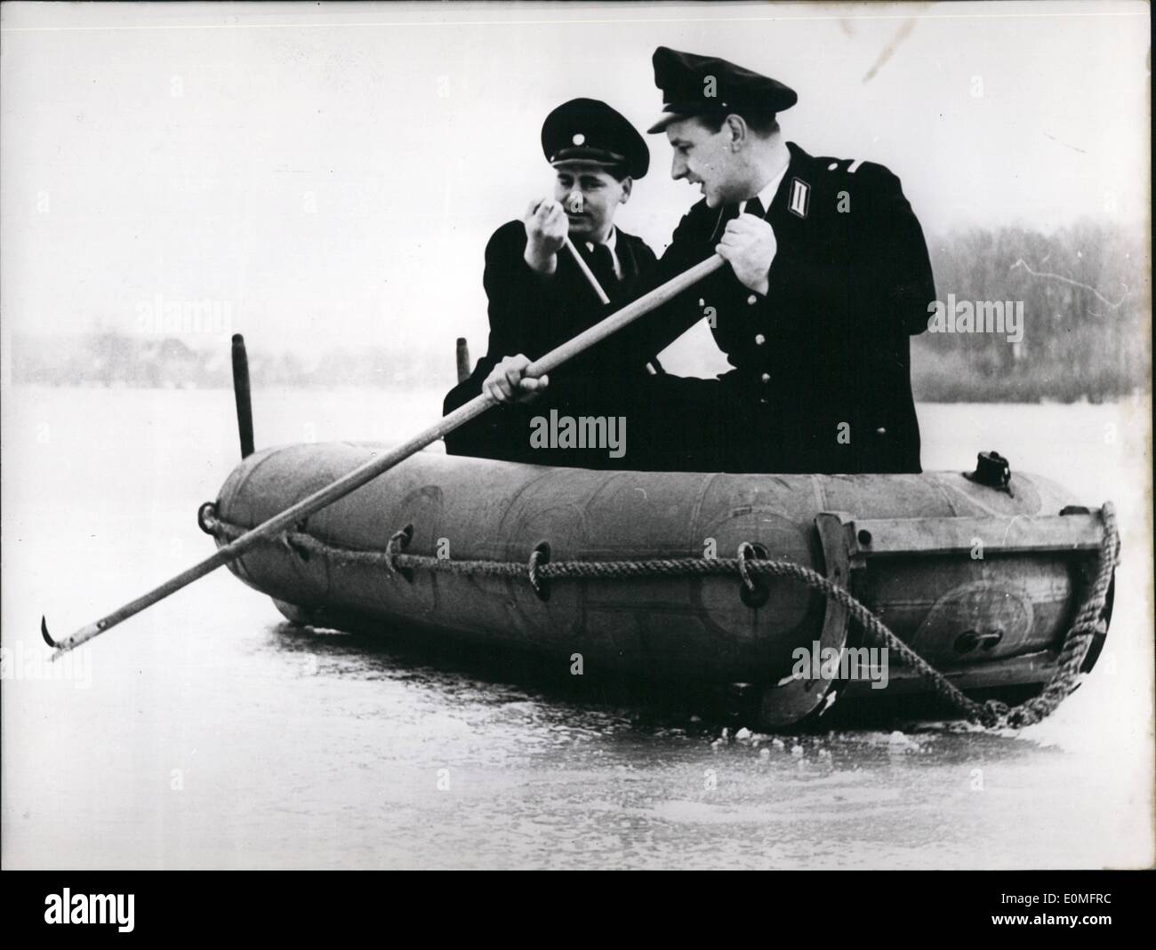Mar. 03, 1955 - Tube - boats with sledge-runners The water-police of Berlin now put in tube-boats with runners to help drawing people. It is possible to push this vehicle very quickly over the ice. Stock Photo