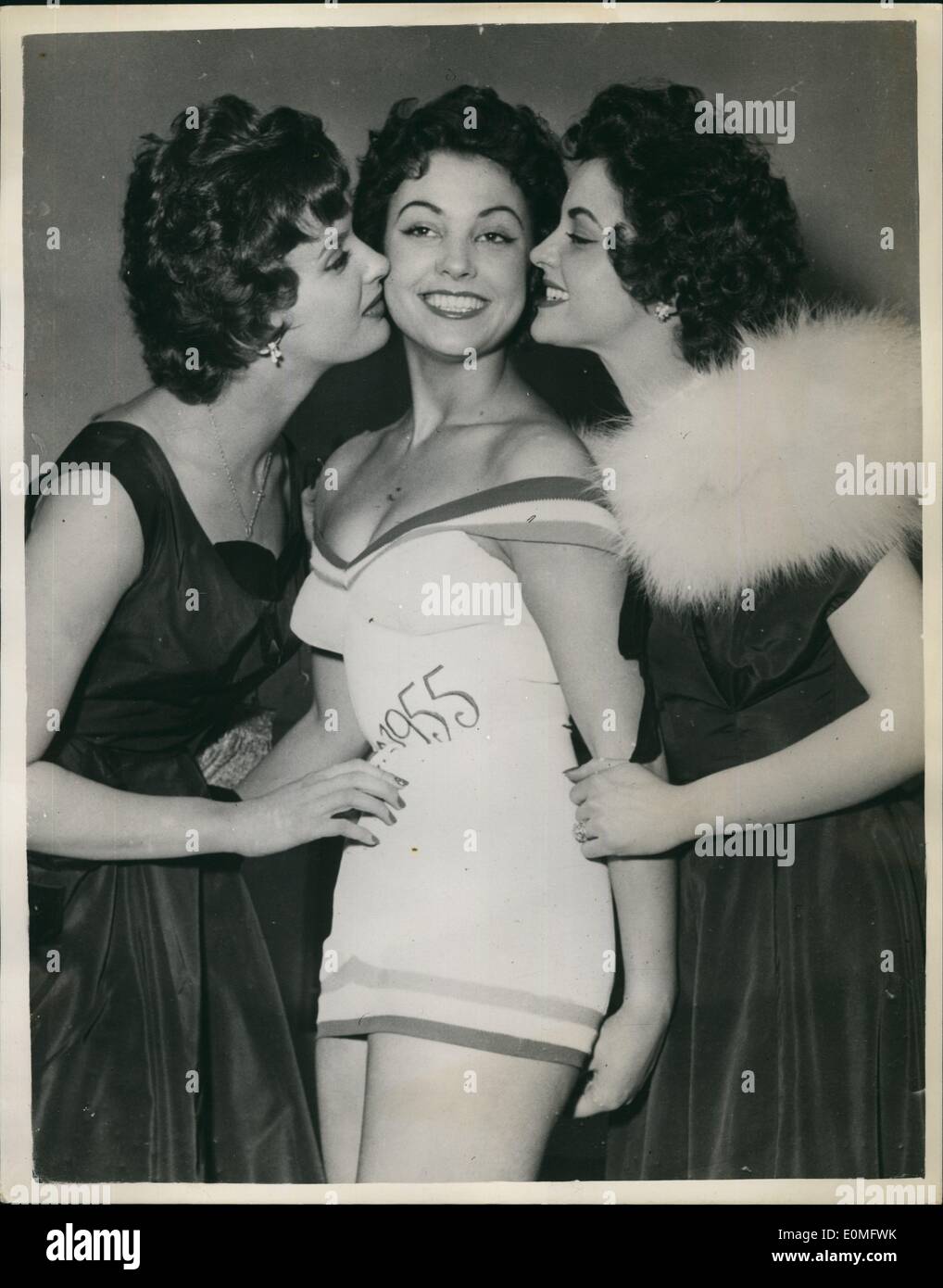 Jan. 01, 1955 - Election of Miss France 1955. Photo shows Mile  Veronique Zuber, aged 19-was won last night elected Miss France 1955 at  Fontainebleu-seen when she received congratulatory kisses from Irene