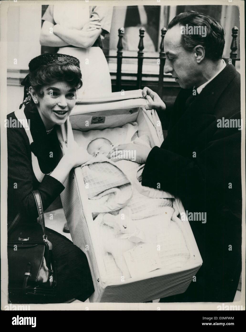 Jan. 01, 1955 - Dawn Addams leaves nursing home with her baby son: Dawn Addams the film star wife of Italian Prince Vittorio Massimo, left the nursing home this morning with her baby son who was born on January 10. Photo shows Dawn Addams with her baby son in a carry cot and her husband Prince Vittorio Massimo seen leaving the nursing home today. Stock Photo