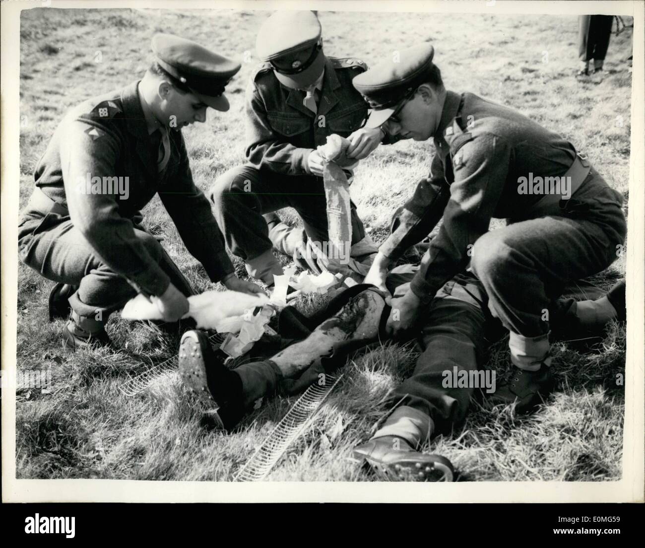 Apr. 04, 1955 - Army officers Recive first aid instruction Atomic Warfare: With the revolution in military strategy brought about by the development of atomic weapons, more and more army units are being trained in the first aid and rescue work - that has hitherto been the province of Civil Defence. The first of these special first aid courses for junior officers and senior N.C.O.s was held today at Ewshot camp, near Aldershot. On the completion of their course they will return to their units as instructors in first aid, with special reference to atomic warfare Stock Photo
