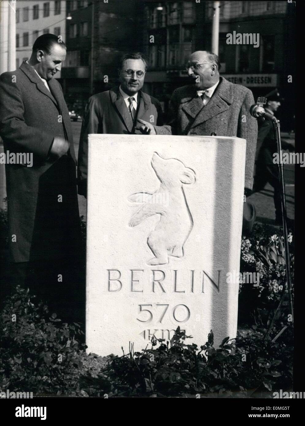 Apr. 04, 1955 - Bonn to Berlin 570 kilometer: At the Rhine-bridge of Bonn, half a way from Paris to Berlin on that street leading from the Seine and Marne, Maas and Mosel to the Elbe and Havel, the first Berlin milestone on the left side of the Rhine was inaugurated by (left-right) Mayor Stelling (Stelling-Bonn), Mp Dr. Gerd Bucerius (Bucerius-deputy fir help of Berlin economy) and the reigning mayor of Berlin Dr. Suhr (Suhr) Stock Photo