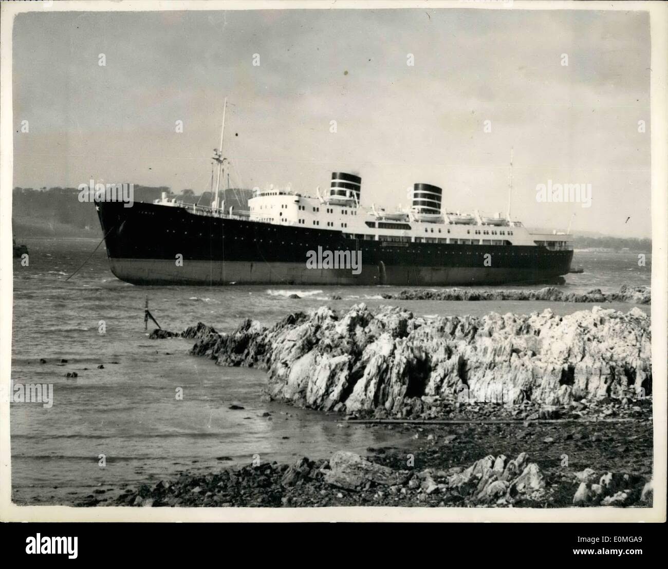 Mar. 23, 1955 - Norwegian liner swept on rocks by gale.. The S.S. Venus at Plymouth.. The 6269 ton Norwegian liner ''Venus'' was swept on to the rocks off Mount Batten, Plymouth today by the sixty mile an hour gale which swept Southern England. The 'Venus' is engaged on a weekly service to Madeira. She had landed 248 passengers from Madeira and Teneriffe, and was due to start the return trip this afternoon. It is not expected that the vessel can be refloated until this evening's tide Stock Photo