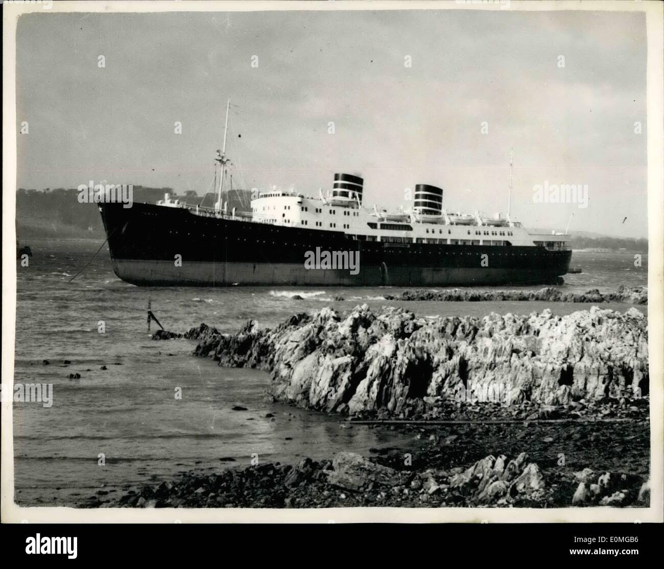 Mar. 28, 1955 - 28-3-55 Norwegian Liner swept on rocks by Gale. Crew come cross ashore by lifeboat. The 6269 ton Norwegian Liner Venus was swept on to the rocks off Mount Batten, Plymouth today by sixty-mile-an-hour gale which swept Southern England. The Ã¢â‚¬ËœVenus' is engaged on a weekly service to Madeira. She had landed 248 passengers from Madeira and Teneriffe, and was due to start the return trip this afternoon. It is not expected that the vessel can be refloated until the evening's tide Stock Photo