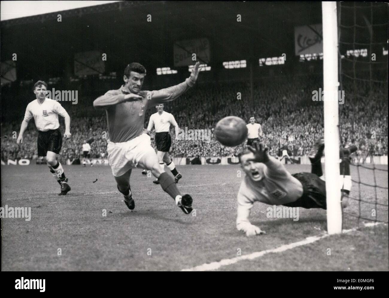 May 05, 1955 - France Beats England By 1 To 0 At Colombes: French Forward Blard shoots. The English goal-keeper Williams stops Stock Photo