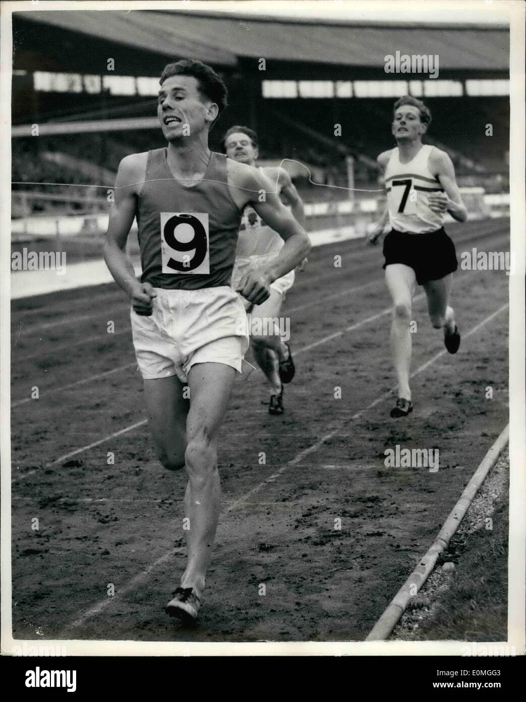 May 05, 1955 - Key Stone Press Agency British Game at White City. First Three Run The Mile in Under Four Minutes. The One Mile International Race at the British Games, White City this afternoon, was won by I. Tabori (Hungary), with a time of 3 min, 59 seconds, C.J. Chataway (Britain), who was second, and B.R. Newson (Britain), was third - also clocked under four minutes. Key Stone Photo Shows: The finish of the One Mile International, at the White City - showing I. Tabori winning from Chataway and Newson. Stock Photo