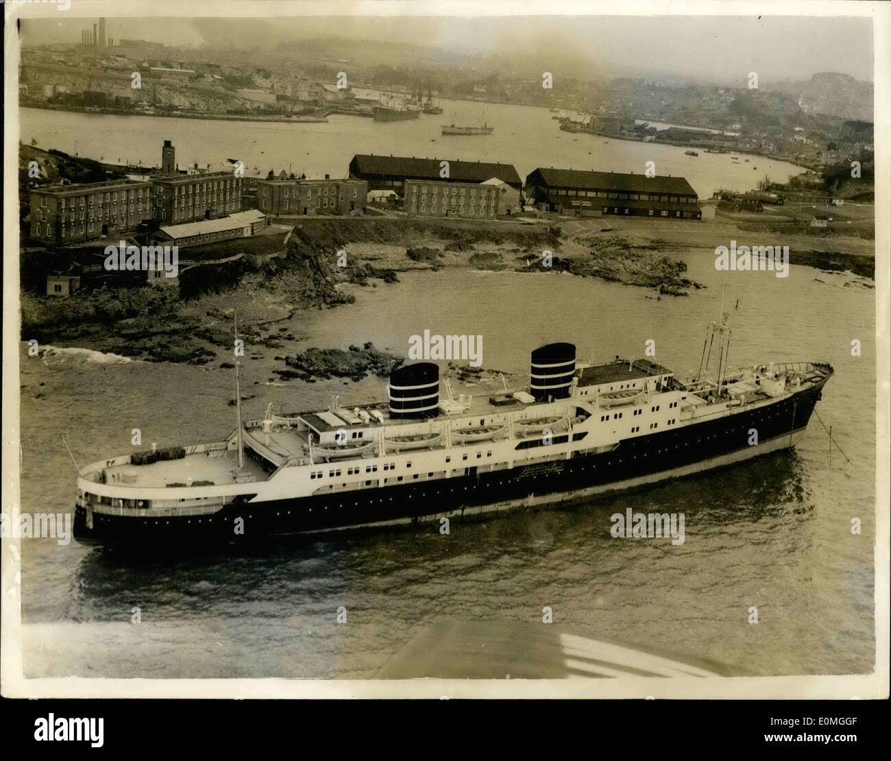 May 05, 1955 - Norwegian Liner Aground Off Plymouth Hoe.. As Seen From The Air.. Never before has a liner come so close to Plymouth Hoe.. So close, in fact, that the 6,269 ton ''Venus'' is on the rocks. Twice yesterday tugs tried to refloat her. This morning's attempt left ''Venus'' as seen in this picture from the air.. Five thousand people watched as tugs tried again last night - the liner lifted but remained fast on the rocks.. Heavy gear and cargo is being removed to give her a better chance of being refloated at the next high tide. Stock Photo
