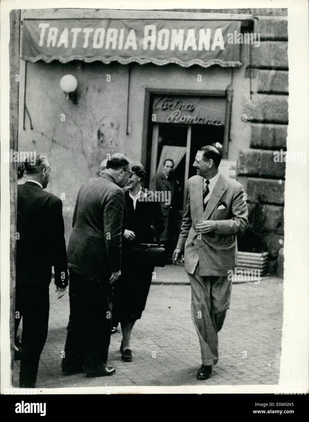 Apr. 04, 1955 - King and Queen of Denmark in Rome: The King and Queen of Denmark in the company of friends, Lunched in a typical Rome ''Trattoria'' (a third class restaurant) in a narrow backstreet, Many of these ''Bistros'' serve excellent spaghetti and fish soup, and no doubt The Majesties wanted to be sample the food eaten by people with modest salaries. The Danish Royal Family are spending a vocation in Rome as Tourists. Picture Shows: King Fred Erik and Queen Ingrid leave their guests outside the ''Trattoria'' after their lunch in Rome. Stock Photo