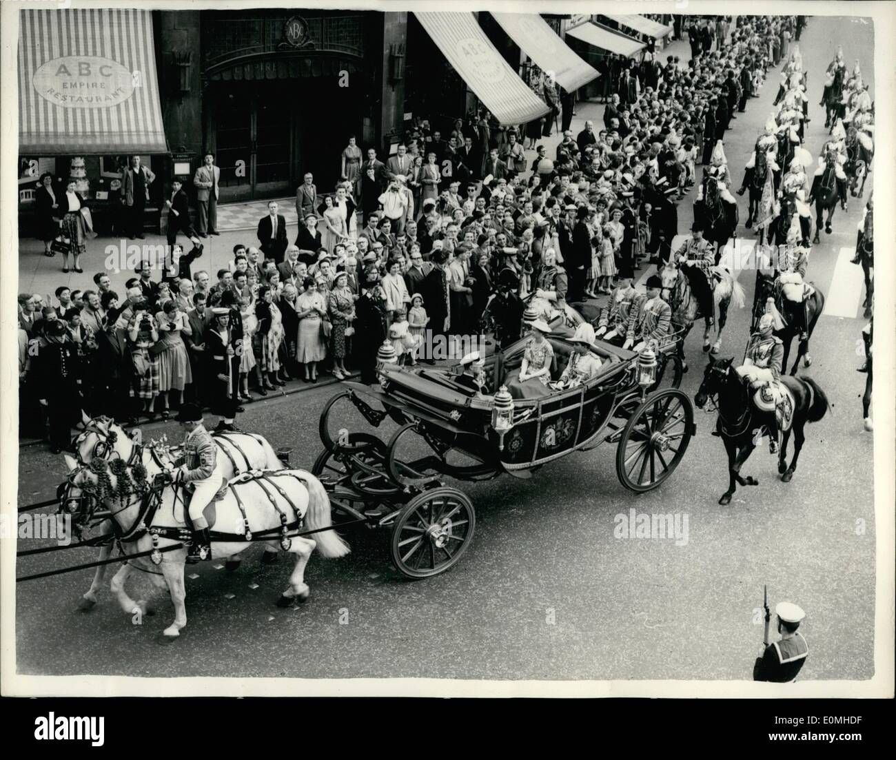 Jul. 07, 1955 - King Feisal Arrives For State Visit: King Feisal of Iraq arrived at Victoria station this afternoon at the start of his state Visit to Britain He was at the station by H.,M. The Queen, the Duke of Edinburgh and other members of the Royal Family, Photo Shows General view as the procession with King Feisal, H.M.The Queen and the Duke of Edinburgh, in the  Victoria on its way to the Palace with on escort of Househoh Stock Photo