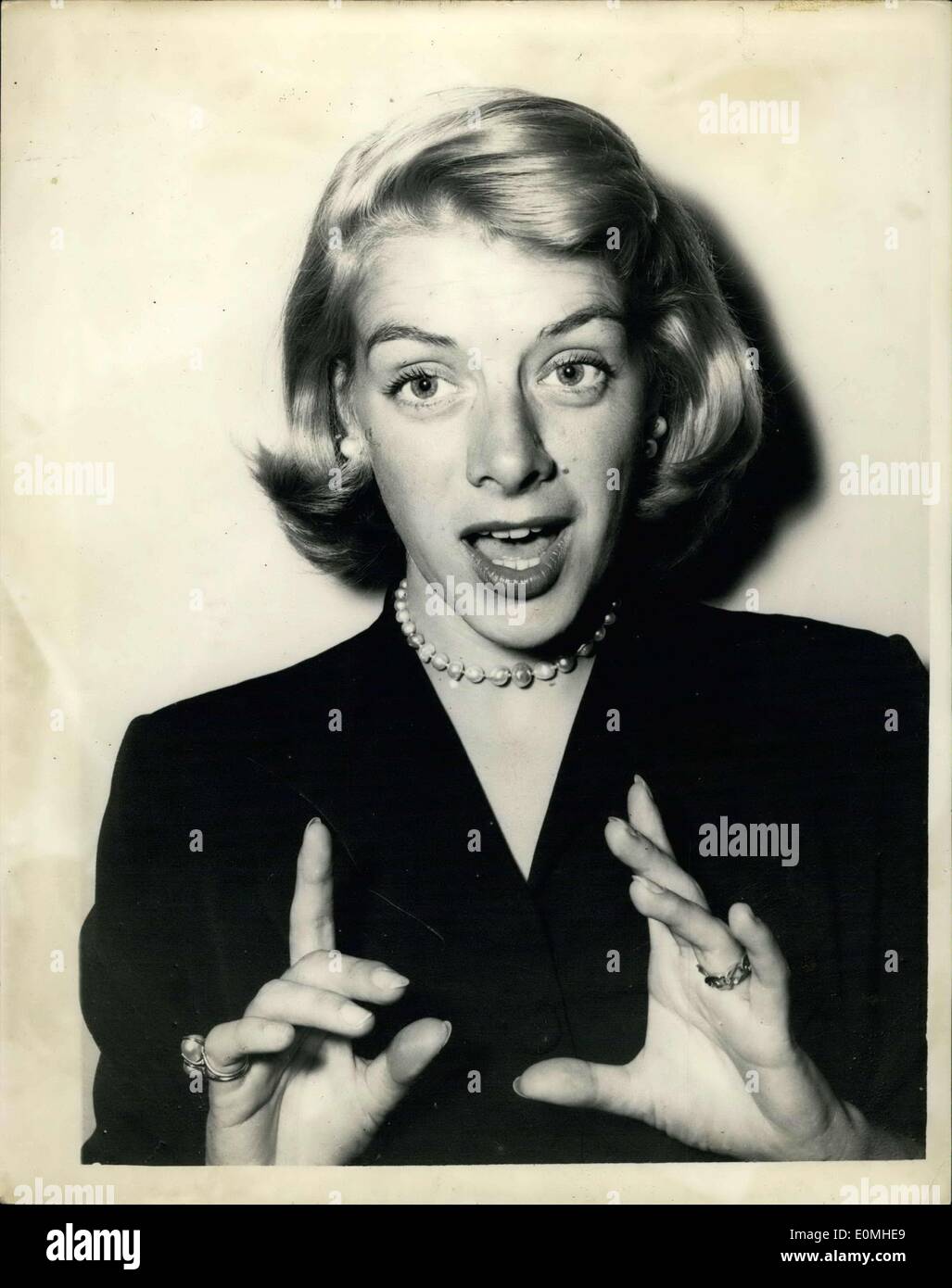Jul. 11, 1955 - Press Reception For Rosemary Clooney. Photo shows The famous American singing star, Rosemary Clooney, who begins a two-weeks season at the London Palladium next Monday - seen singing a song at this afternoon's Press Reception at The Prince of Wales Theatre. Stock Photo