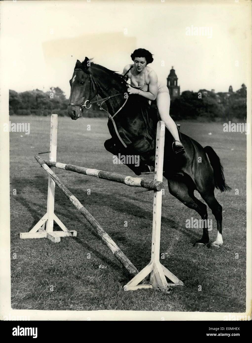 Jul. 16, 1955 - She Goes Horse Jumping In A Bathing Suit... One Way of Keeping Cool: Miss Margaret Podmore was taking part in a Stock Photo