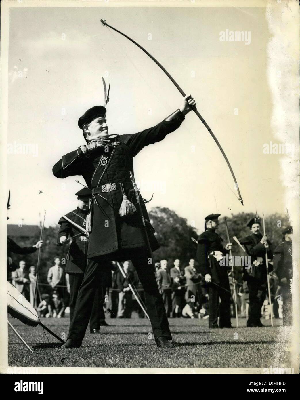 May 17, 1955 - Shooting for the ''edinburg Arrow'' Archery contest in Scotland/: The Royal Company of Archers - The Queen's Bodyguard for Scotalnd shot for the Edinburgh Arrow at the West Meadows, Ediburgh. Photo shows Brigadier T. Grainger Stewart lets an arrow go for the target during the contest. Stock Photo