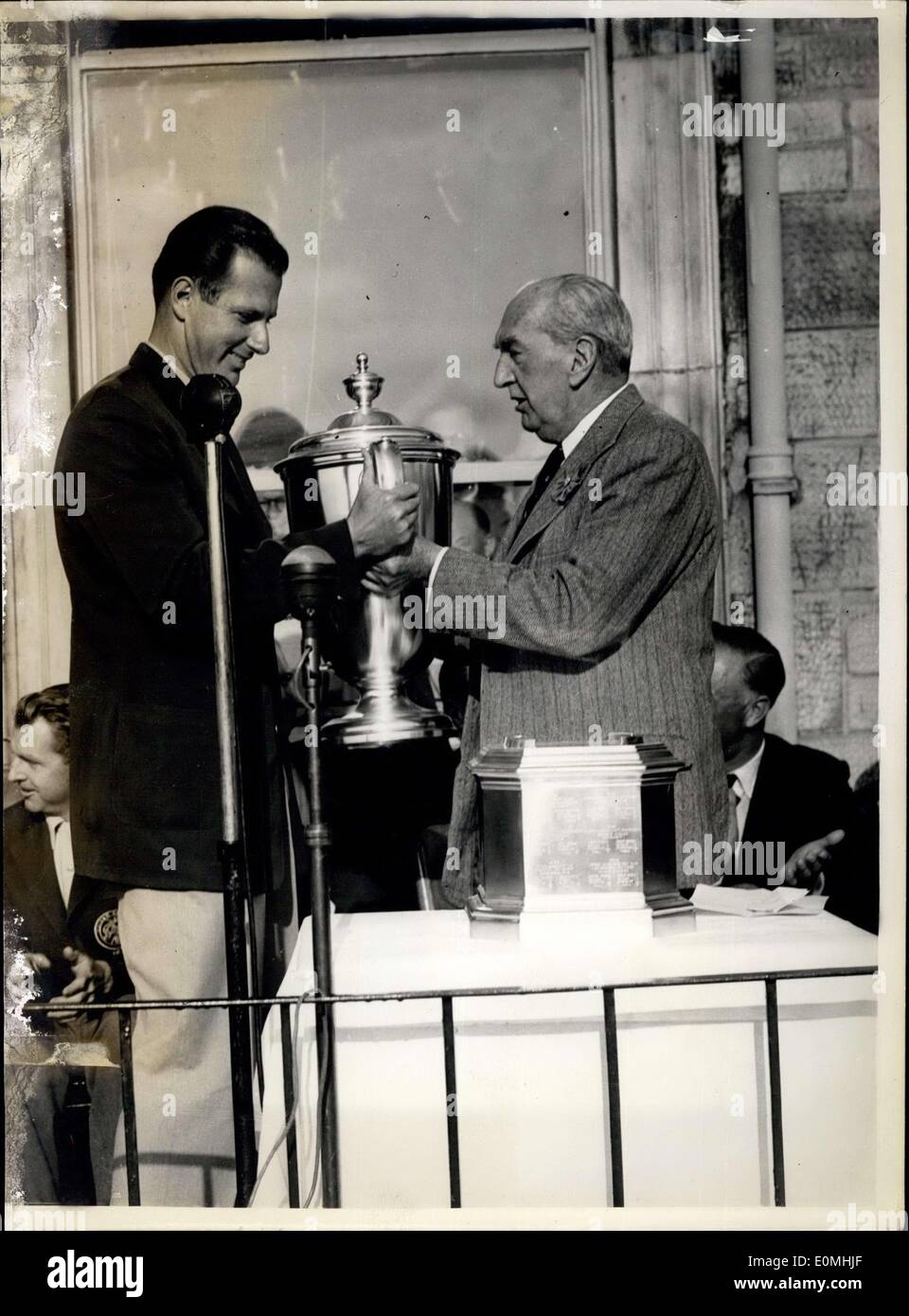 May 23, 1955 - Golf at St.Andrews. America wins Walker Cup: Photo Shows Bill Walker. captain of the victorious American Walker Cup team-seen receiving the Walker Cup from Lord Bruce at St.Andrews. Stock Photo