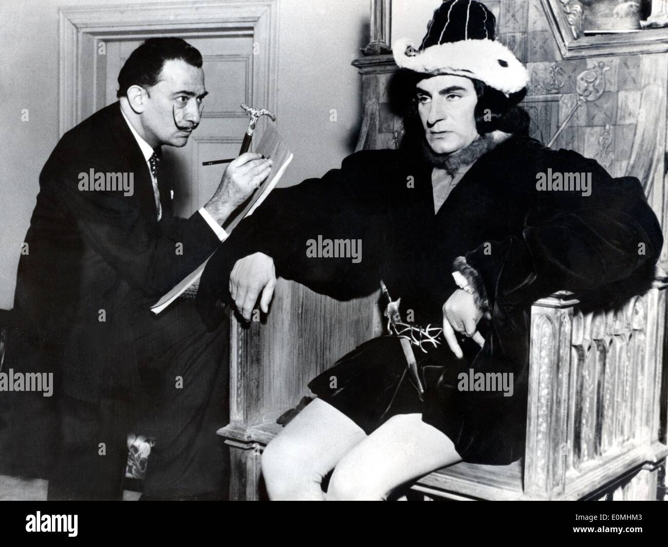 Salvador Dali sketching Sir Laurence Olivier dressed as Richard III Stock Photo