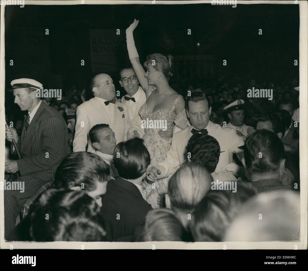 Aug. 08, 1955 - Opening of Venice film festival : The Venice film Festival opened on Thursday at the Lido, and several celebrated actresses and actors arrived to see the first film. There was general confusion when they arrived at the cinema. Photo shows The scene when Sophia Loren, arrived in a ficrew with some difficulty. Stock Photo