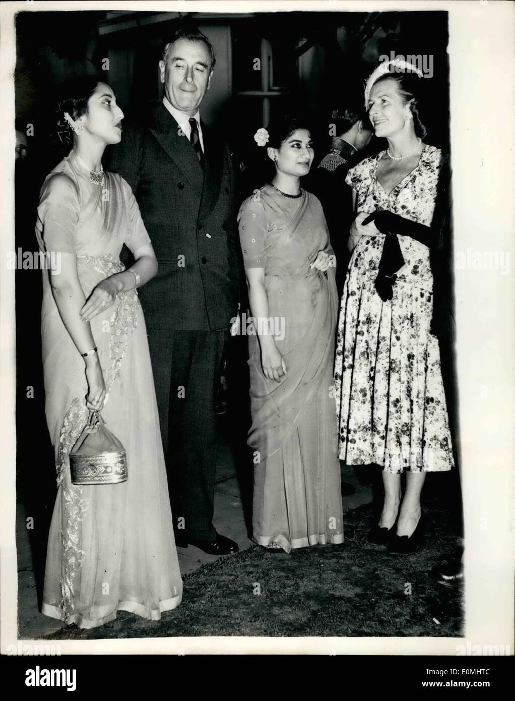 Aug. 08, 1955 - Pakistan High Commissions Holds Big Diplomatic Party. Hundreds of guests attended a diplomatic party given by the Pakistan High Commissioner, Mr. Mohammed Ikramullah and his wife at Lowndes Square this evening. Photo Shows: Lord and Lady Mounbatten pictured with Mrs. Mohsin, from Pakistan (left) and Miss Mubarak Ali, also of Pakistan (centre) at the reception. Stock Photo