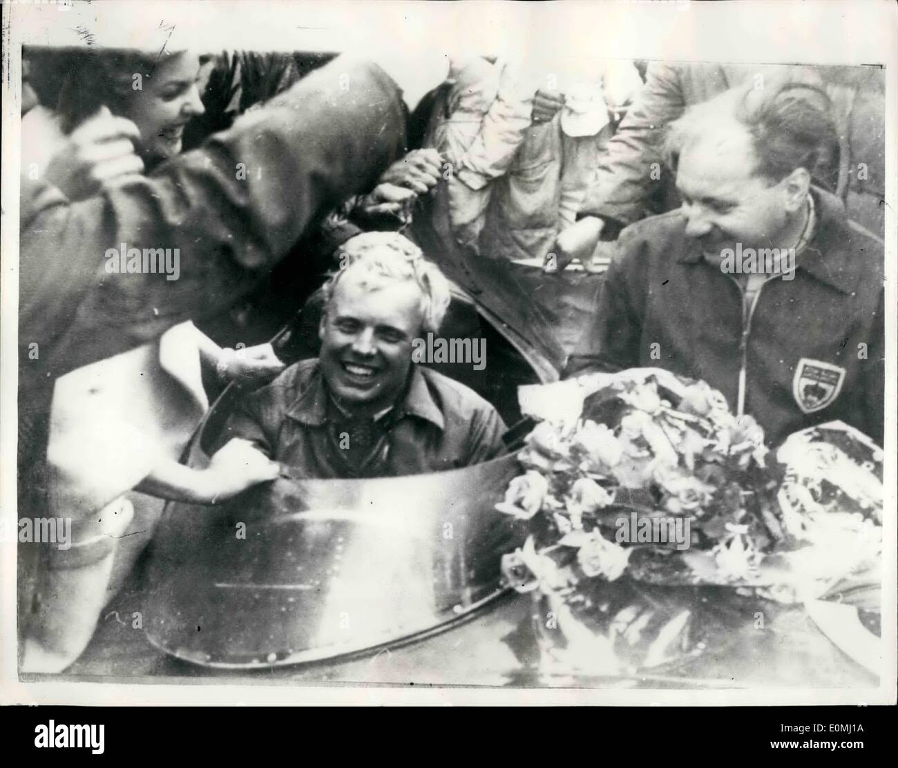 Jun. 06, 1955 - Mike hawthorn wins the Le mans race. photo shows mike hawthorn (left), seen after winning the Le mans 24-hour co-driver Ivor Bueb. Stock Photo