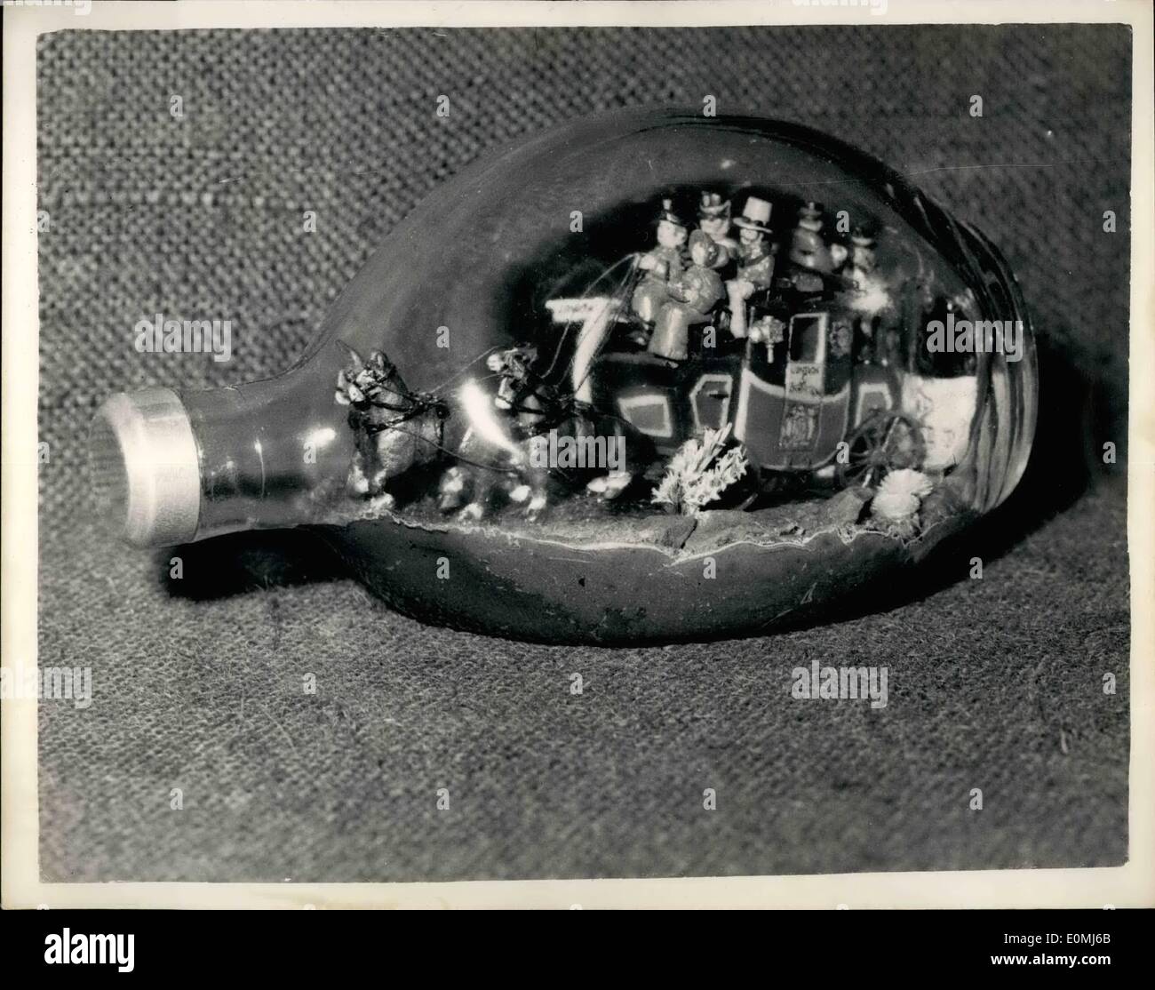 Aug. 16, 1955 - 16.8.55 Model Engineer Exhibition Preview. The Medal Engineer Exhibition and Exhibition of Inventions, opens tomorrow at the New Horticultural Hall, Westminster. Keystone Photo Shows: A tiny stage coach inside a bottle the work of Mr. Norman Denis Brooks, of Luton seen at today's preview. Stock Photo