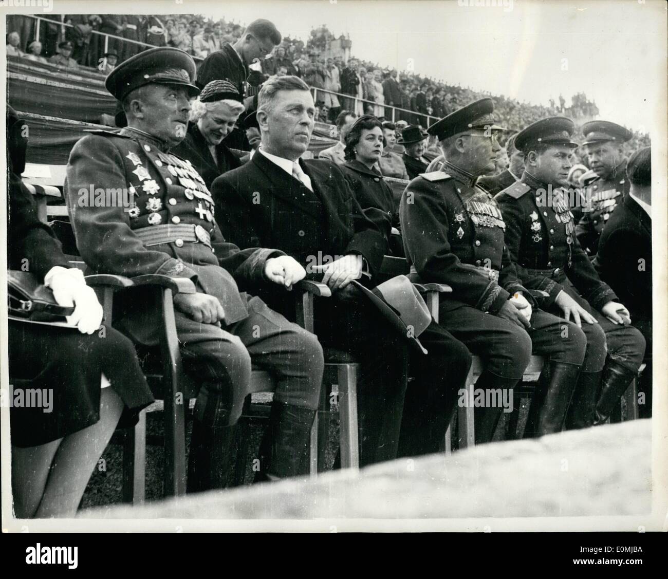 Jun. 06, 1955 - British occupation troops take part in coronation parade in Berlin.: Nearly 60,000 Berliners watched British troops units take part in a coronation day parade at ''Mayfield'', near the Olympic stadium, Berlin on June 2nd. Photo shows among the spectators watching the parade were General Dgi (civilian) leader of the Soviet control Commission in Berlin and his his representative Trusso, seen in uniform. Stock Photo