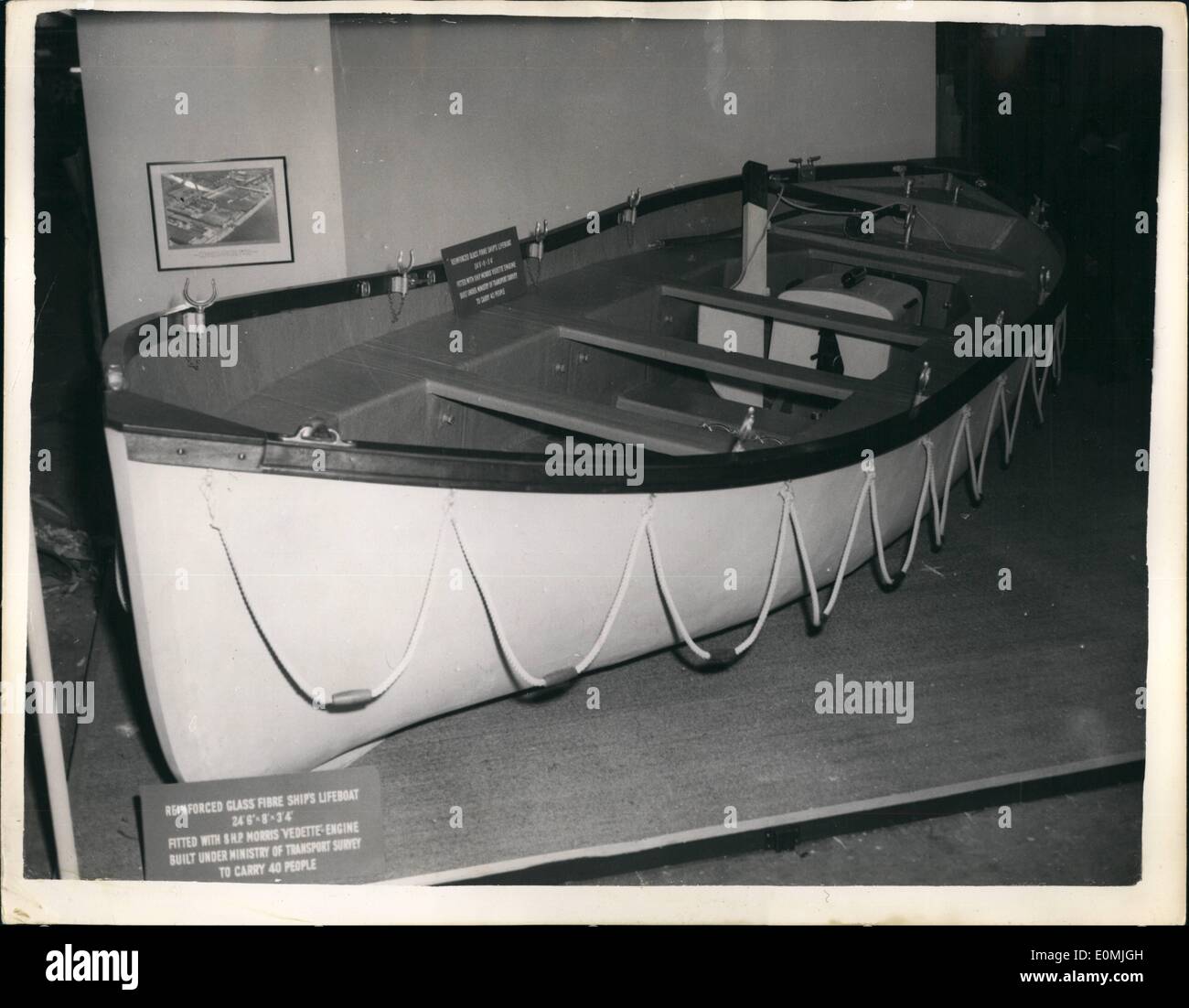 Sep. 09, 1955 - Engineering, Marine and Welding Exhibition And The Foundry Trades Exhibition - At Olympia: The 1955 Engineering, Marine and Welding Exhibition and the Foundry Trades' Exhibition, opened today at Olympia. Photo Shows: Seen on the Mechans Ltd, Glasgow, stand at the Exhibition today - is this reinforeced Glass Fibre ship's lifeboat - which is fitted with an 8 h.p. Morris Vedette engine, and can carry 40 people. It is ft Sins by 8ft by 3ft, 4 ins. Stock Photo