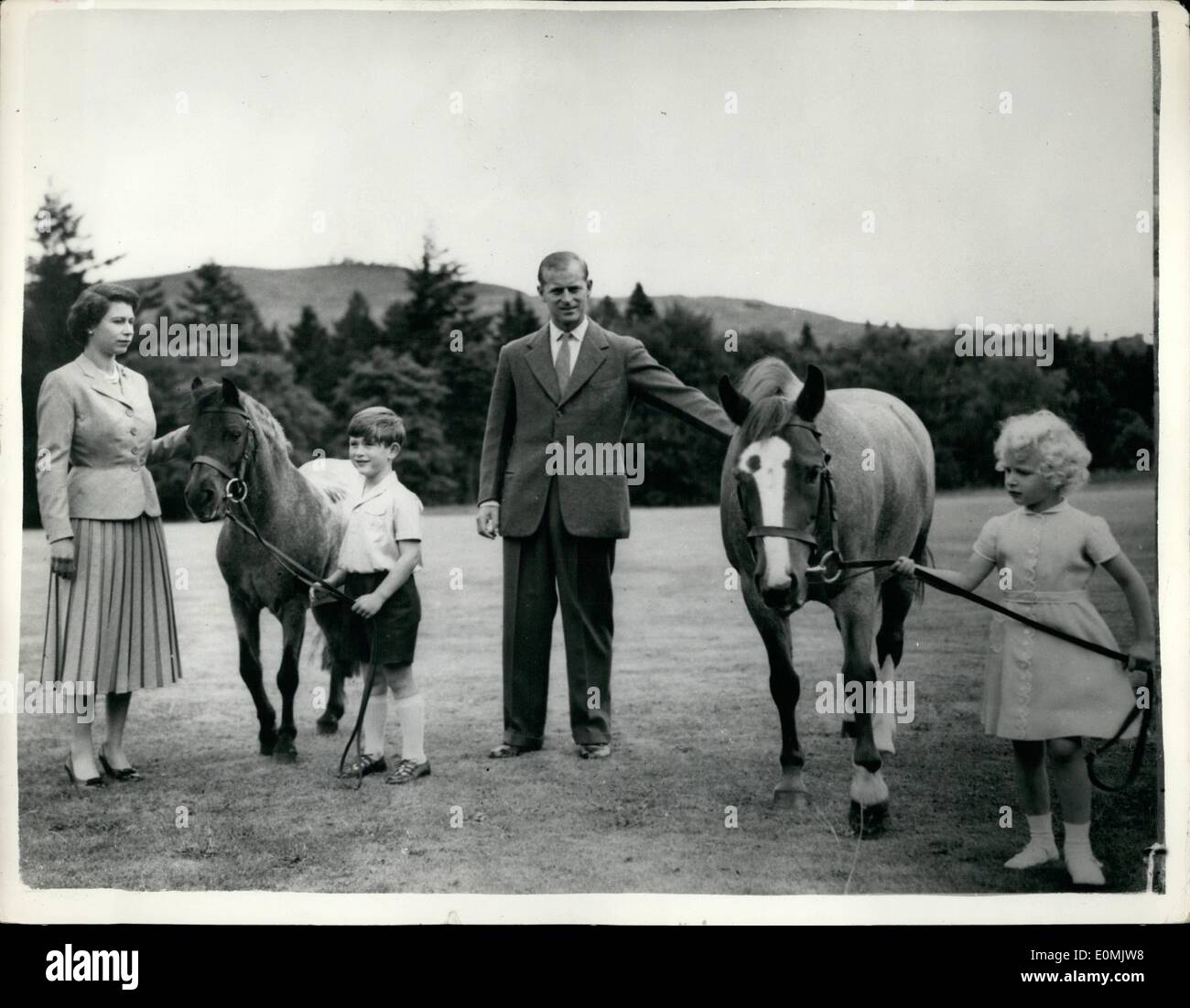 Sep. 09, 1955 - Royal Family At Balmoral. Exercising The Ponies: Queen Elizabeth - Duke Of Edinburgh and their children Prince Charles and Princess Anne exercise their ponies in the grounds of Balmoral Castle during the August holiday this year. Prince Charles holds ''Williams''; Princess Anne holds ''Greensleeves''. Balmoral is an 11,000 acre estate bought by Prince Albert in 1852 for 31,00 - the castle being built three years later - and is the private property of the Sovereign. Stock Photo