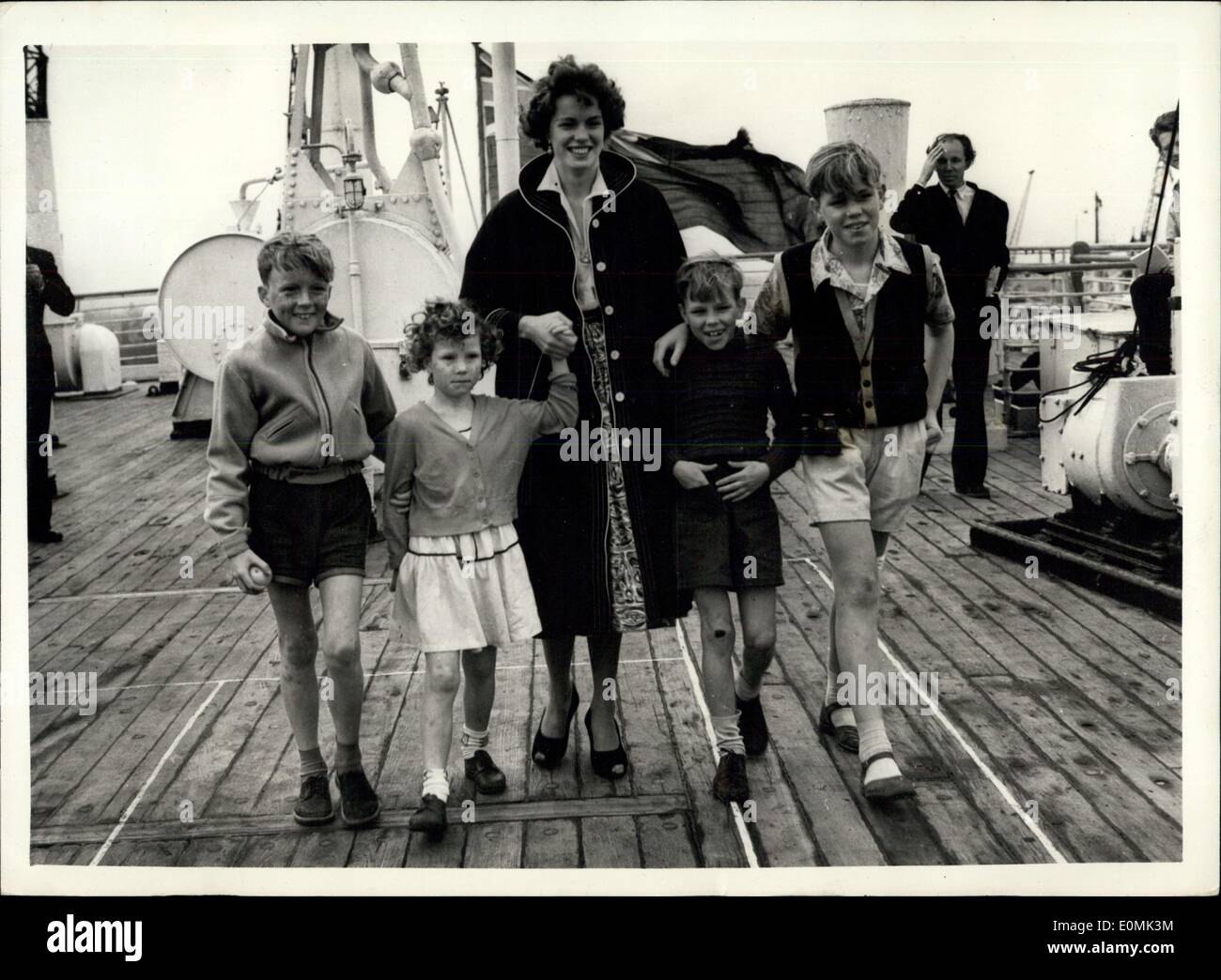 Sep. 15, 1955 - Anne Zandvliet walking on the deck of the Orontess at Tilbury today. They are L to R: Robert (8); Paulina (6); Anna (21); Gerrard (9) and Adriane (12) Stock Photo