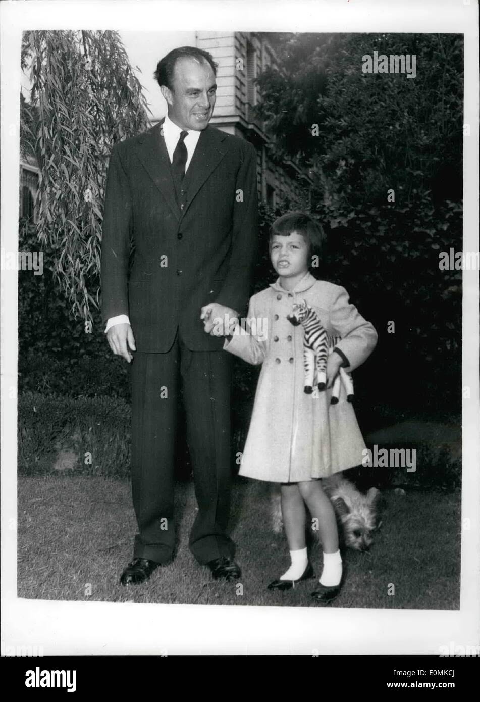 Oct. 10, 1955 - Prince Aly Khan and daughter Yasmin. Photo shows Prince Aly Khan pictured with his little daughter Yasmin, in the garden of his house in Neuilly, Paris, yesterday. Stock Photo