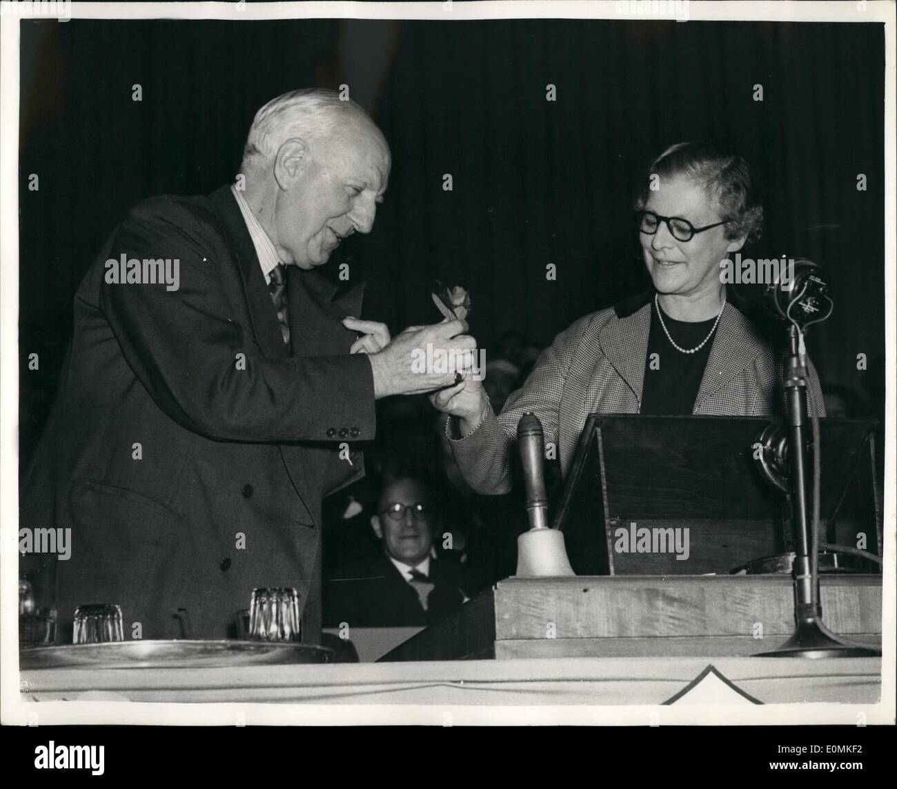 Oct. 10, 1955 - Conservative party says goodbye to Lord Woolton: The Conservative party today said farewell to the retiring chairman, Lord Woolton, who was attending the Conservative Party Conference at Bournemounth for the last time as chairman of the Party. Photo shows Lord Woolton, is presented with a Red Rose of Lancaster at Bournemouth today by Alderman the Hon. Mrs. Evelyn . J.P. M.P. Chairman of the Conference. Stock Photo