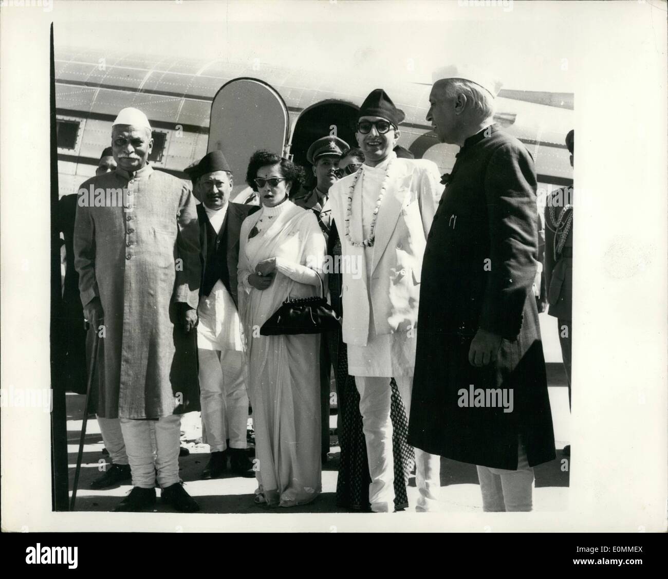 Nov. 09, 1955 - 9-11-55 King and Queen of Nepal on State visit to Delhi greeted by President. Dr. Rajendra Prasad, the President of India wen to Palam Airport, Delhi recently to greet King Mahendra and the Queen of Nepal, who arrived on a State visit to India. The Royal guests travelled to Delhi in the President's Dakota aircraft. Keystone Photo Shows: The group at the airport, seen left to right: Dr. Rajendra Prasad the Indian President; Queen of Nepal; Mrs. Indira Gandhi, daughter of Mr. Nehru; King Mahendra and Mr. Nehru. Stock Photo