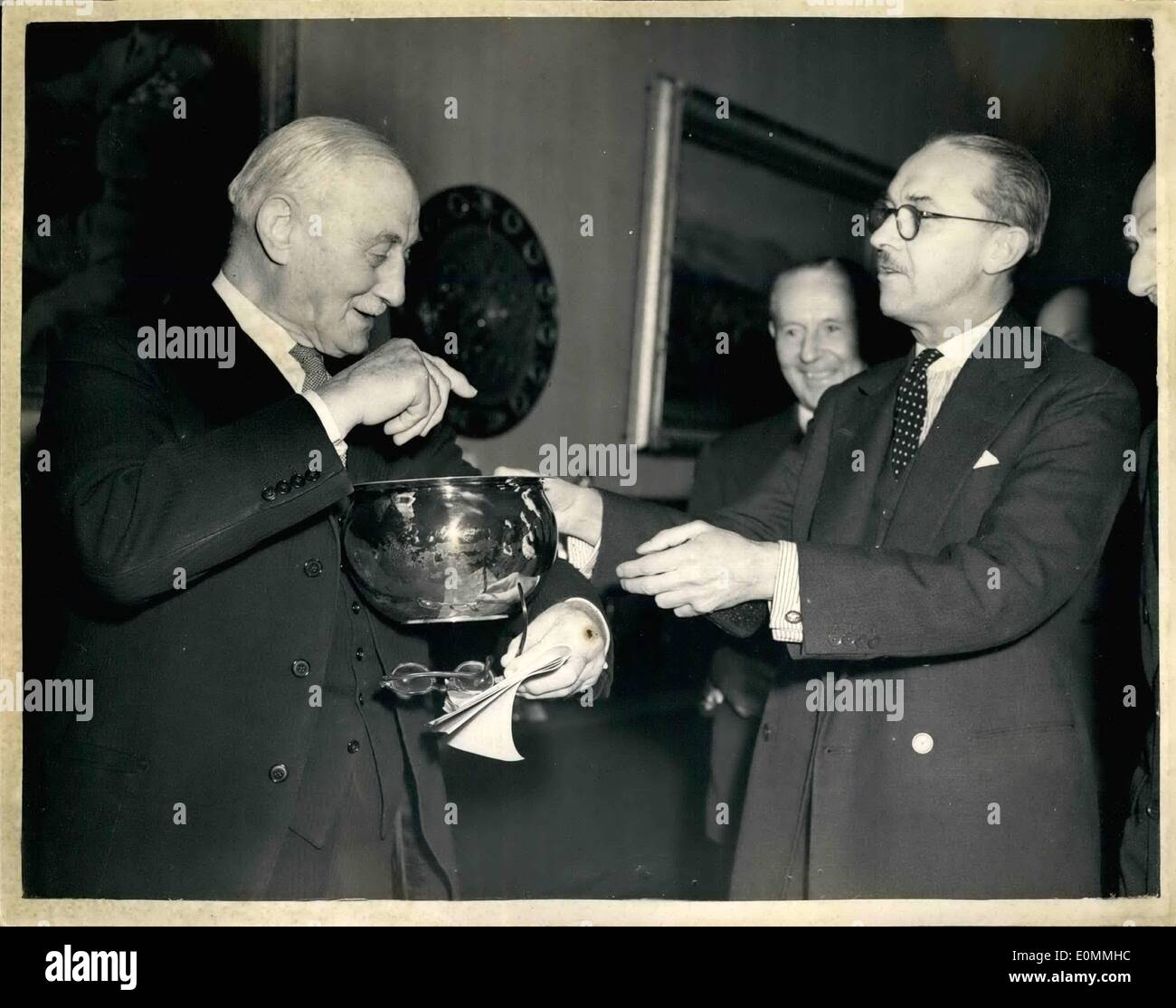 Mar. 03, 1956 - The C.I.G.S. Opens ''Tradition in Silver'' Exhibition. The Silver Chamber Pot... The Chief of the Imperial General Staff General Sir Gerald Templer this morning opened the ''Tradition in Silver'' exhibition of silver pieces from officers' messes of the three services - at the Royal Academy... The exhibition has been arranged by the Soldiers' Sailors' and Airmen's Family Association.. Stock Photo