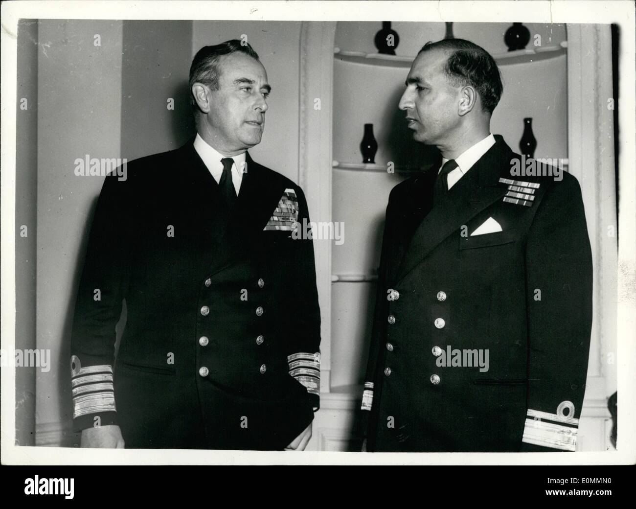Dec. 12, 1955 - Pakistan's Naval Commander-In-Chief Lunches With Lord Mountbatten: Rear Admiral Choudri the Pakistan Naval Commander-in-Chief who arrived in London last evening for talks with the Admiralty - was entertained to Lunch by Lord Mountbatten at the latter's home in Wilton Crescent today. Photo shows Rear Admiral Choudri and Lord Mountbatten - during the lunch today. Stock Photo