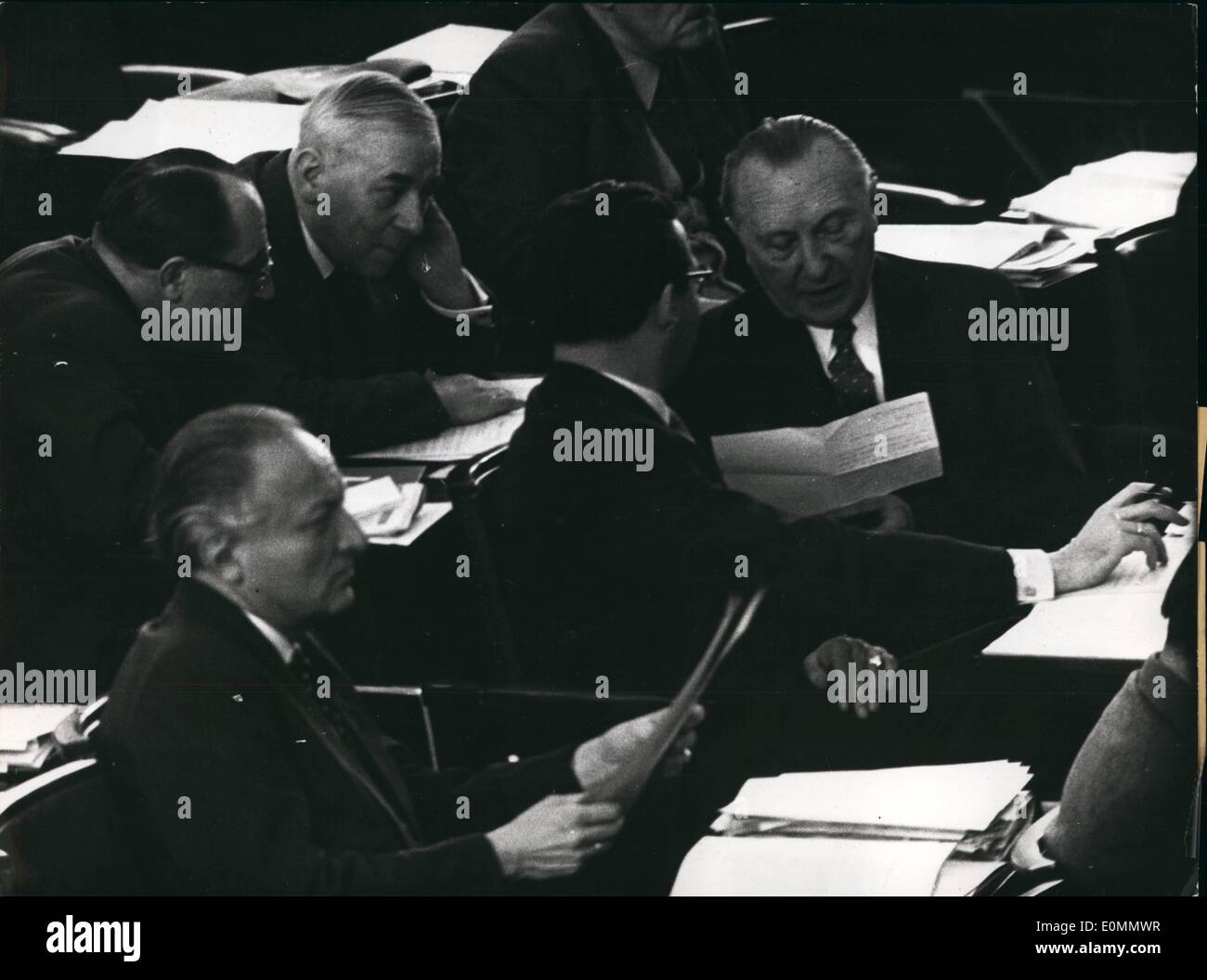 Mar. 03, 1956 - At Bonn... Adenauer is reading a letter. Full of interests are listening Pferdmenges and Lenz - on the other side of him members of the CDU Rasner and - in front of him Dr. Furler. Stock Photo