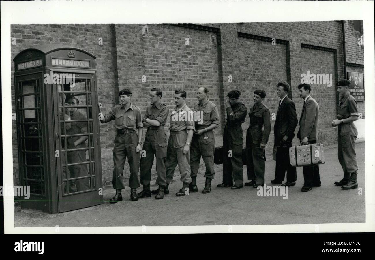 Mar. 03, 1956 - Operation Suez Begins... Troops Line Up to ''Ring'' Home... Men of the Oxford and Bucks Light Infantry were to be seen at Warley Barracks, Essex today - preparing for duty - owing to the Suez Canal Emergency... Some have been recalled from leave. Keystone Photo Shows: Men of the Infantry line up to 'ring' home - outside the Barracks at Warley - today. Stock Photo