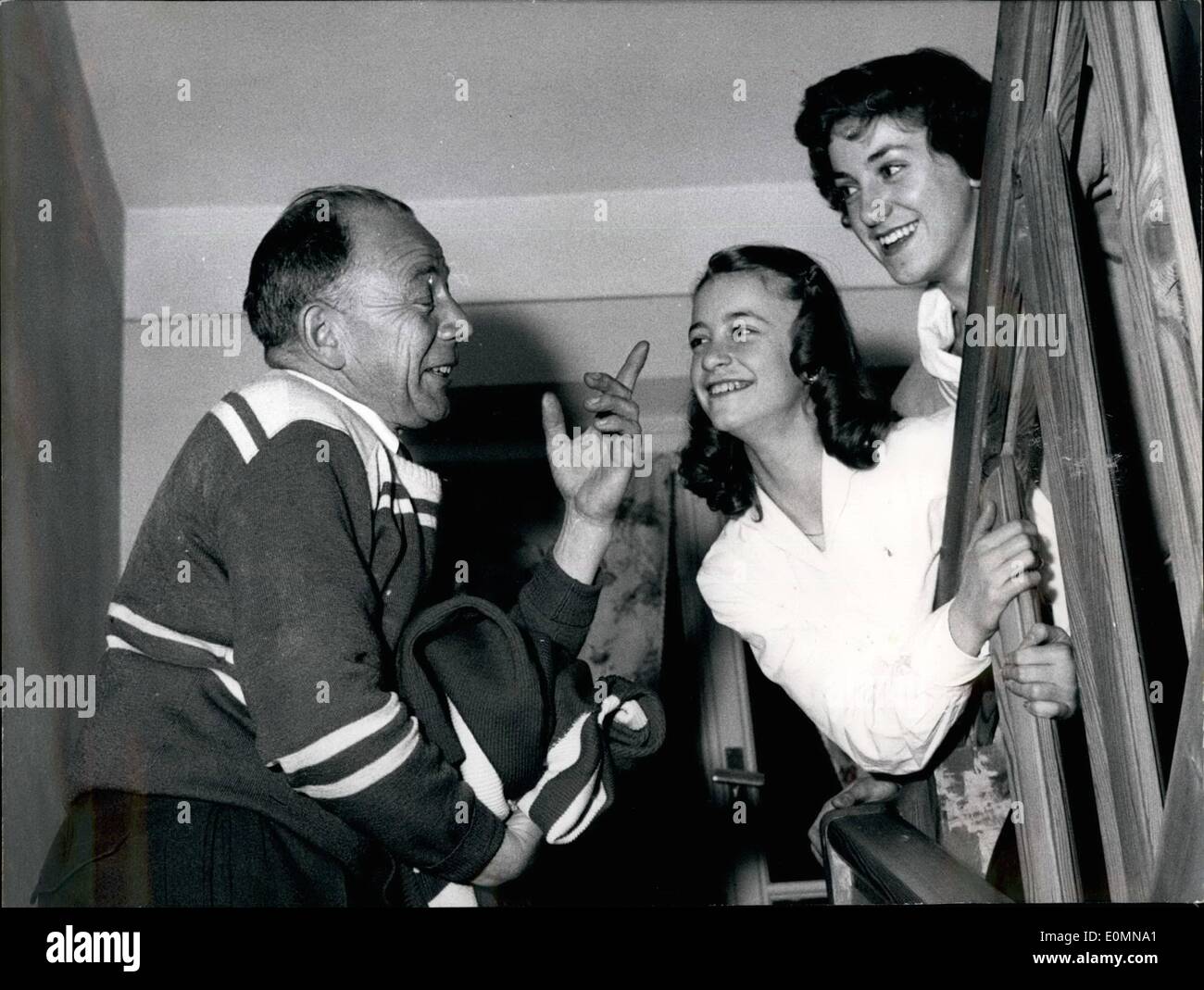 Jan. 01, 1956 - ''I tell you what'': the manager of the DDR crew to the western girls Marika Kilius (1.) (KILIUS) and Rosl Pettinger (r.) (PETTINGER) says. Mr. Schuhmacher (SCHUHMACHER) warned the girls - for fun! But the two say: ''Don't pull our legs and sleep well!'' disappearing upstairs. Stock Photo