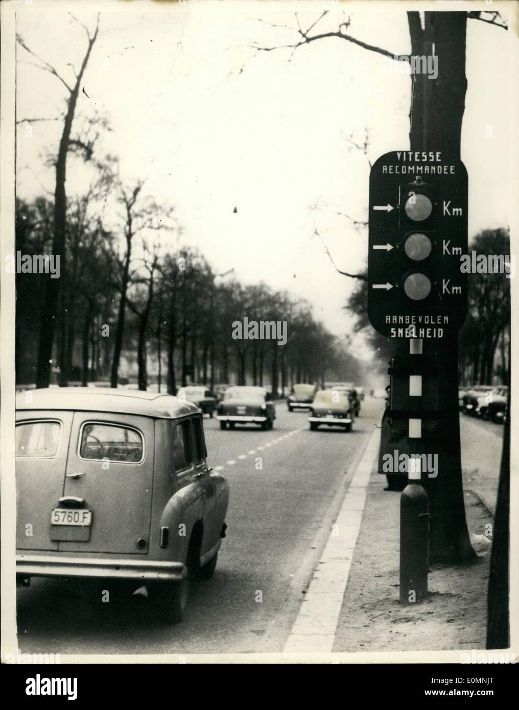 Jan. 01, 1956 - Novel ''Keep The Traffic Rolling'' Innovation In Brussels.. Maintain This Speed And Light Will Be Green.!! A novel innovation has been installed on the road between Porte de Namur and Port Louise in Brussels... A traffic signal indicates three different speeds i.e. 35; 45 and 55 kph.. I the driver keeps his car travelling at the speed indicated by the arrow he will find the next traffic light at green - so that he has a clear way through.. it is hoped that this scheme will prevent traffic being held up at the road junctions. Stock Photo