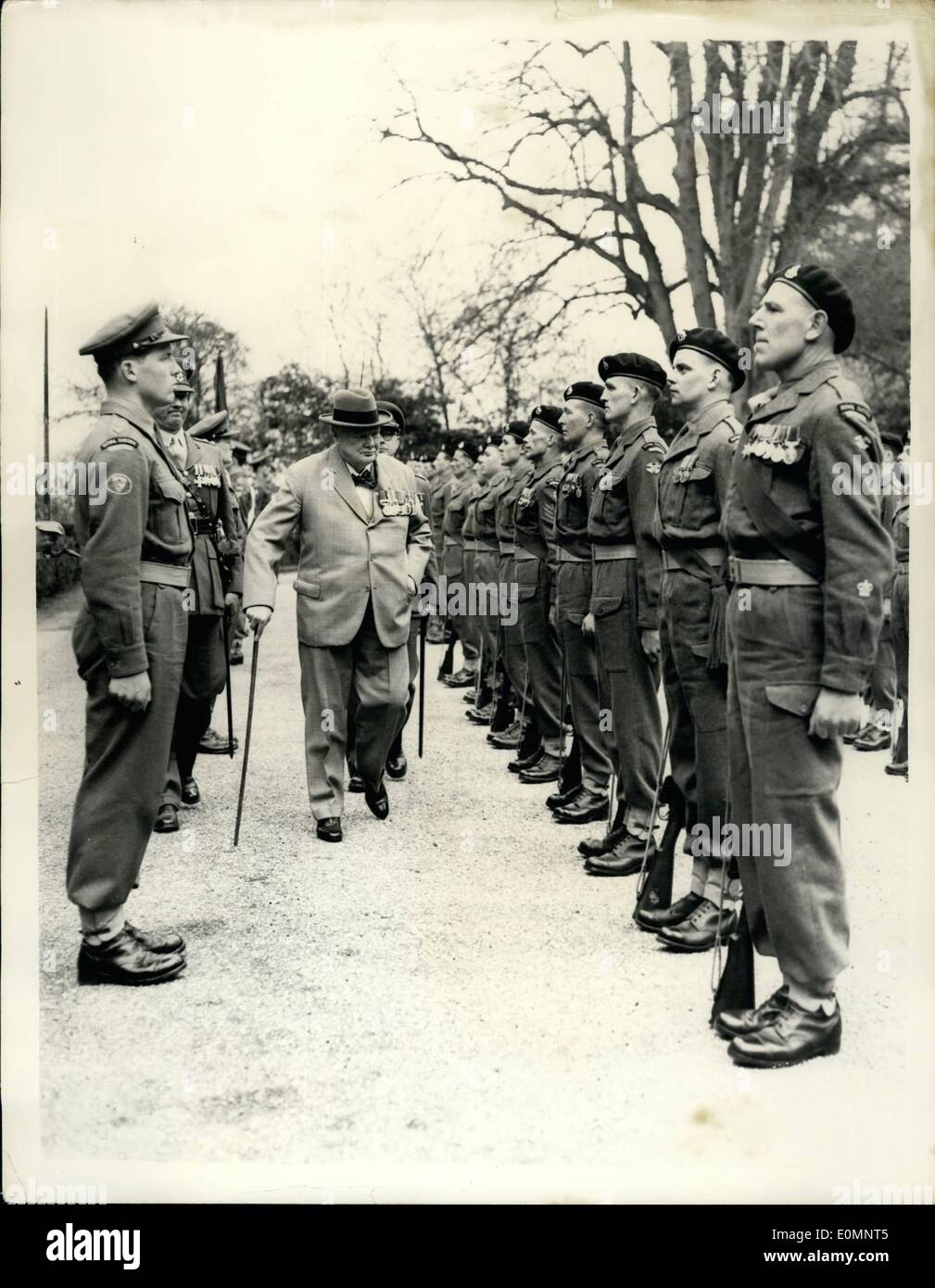 Apr. 04, 1956 - Sir Winston Churchill is visited by men of the Battalion at Chartwell. Sir Winston Churchill - who is Hon. Volenel of the 5th. ( Cinqus Ports ) Battalion, the Royal Sussed Regiment T.A., was this afternoon visited by a party of seven officers and 40 other ranks of the Regiment at Chartwell. He took the saluts and inspected the other ranks. Photo Shows The officers and men face each other - as they are inspected by Sir Winston Churchill owing to the lack of space - at Chartwell this afternoon. Stock Photo