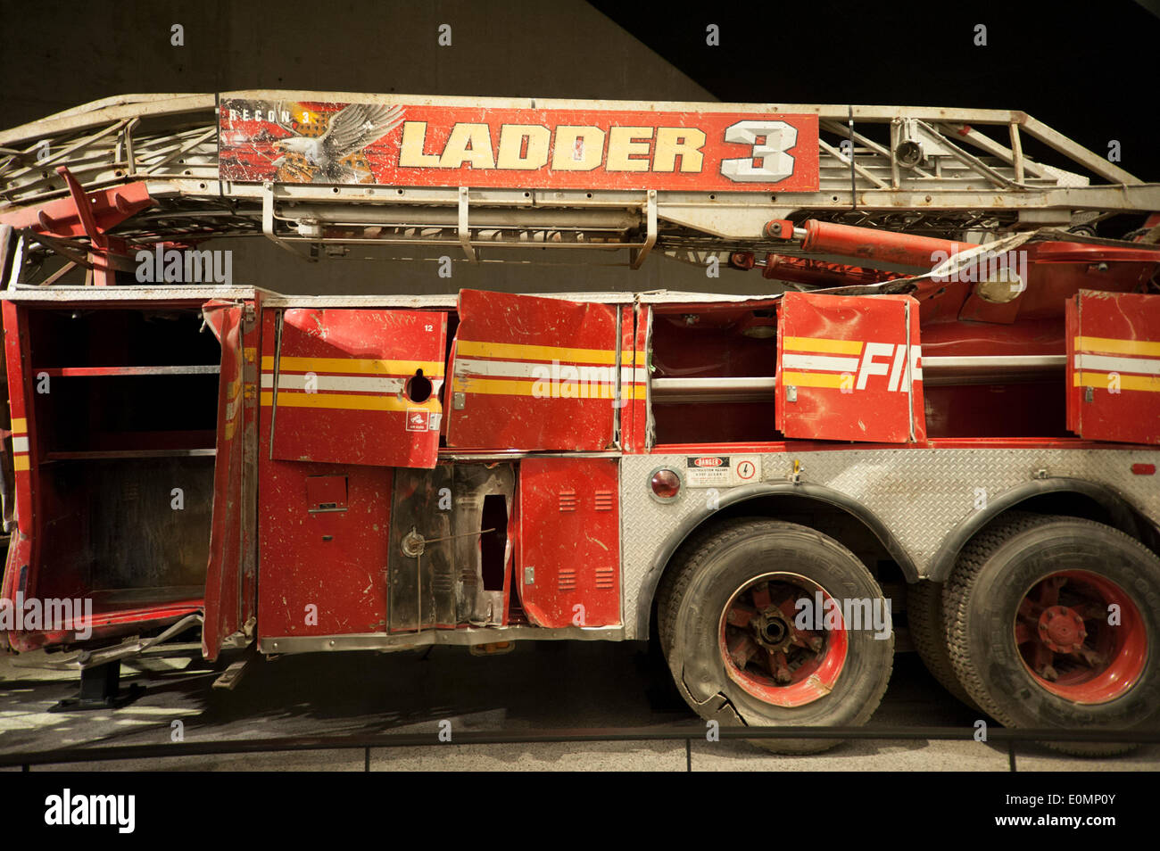 New York, NY, USA. 15th May, 2014. A firetruck in the National September 11 Memorial Museum was crushed when the Twin Towers were destroyed on Sept. 11, 2001. The museum opened on May 15, 2014. (Photo: Terese Loeb Kreuzer) Credit:  Terese Loeb Kreuzer/Alamy Live News Stock Photo