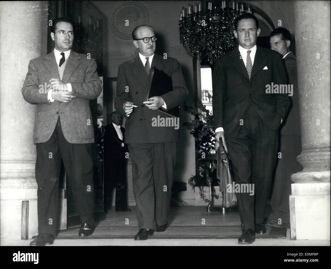 Apr. 04, 1956 - Mr. Mollet (President of the Council), Mitterrand, and Bourges-Maunoury (Minister of National Defense) are pictured leaving the Elysee Palace. German General Hasso von Manteuffel Stock Photo