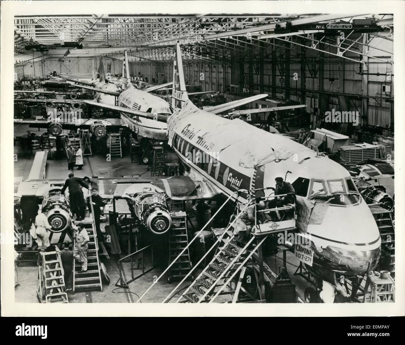 Feb. 02, 1956 - Line on British production for U.S.: Flying with Capital Airlines is the British Vickers Viscount, world's first propeller turbine airliner. Out of the 20 ordered by Capital, nine have so far been delivered and other are in production. Photo shows Viscounts for Capital Airlines on the No. 1 production line at the Vicker factory at Hurn, England. The plane, powered by four Rolls Royce Dart engines, has been bought by the airlines of 13 other countries besides the U.S. Stock Photo