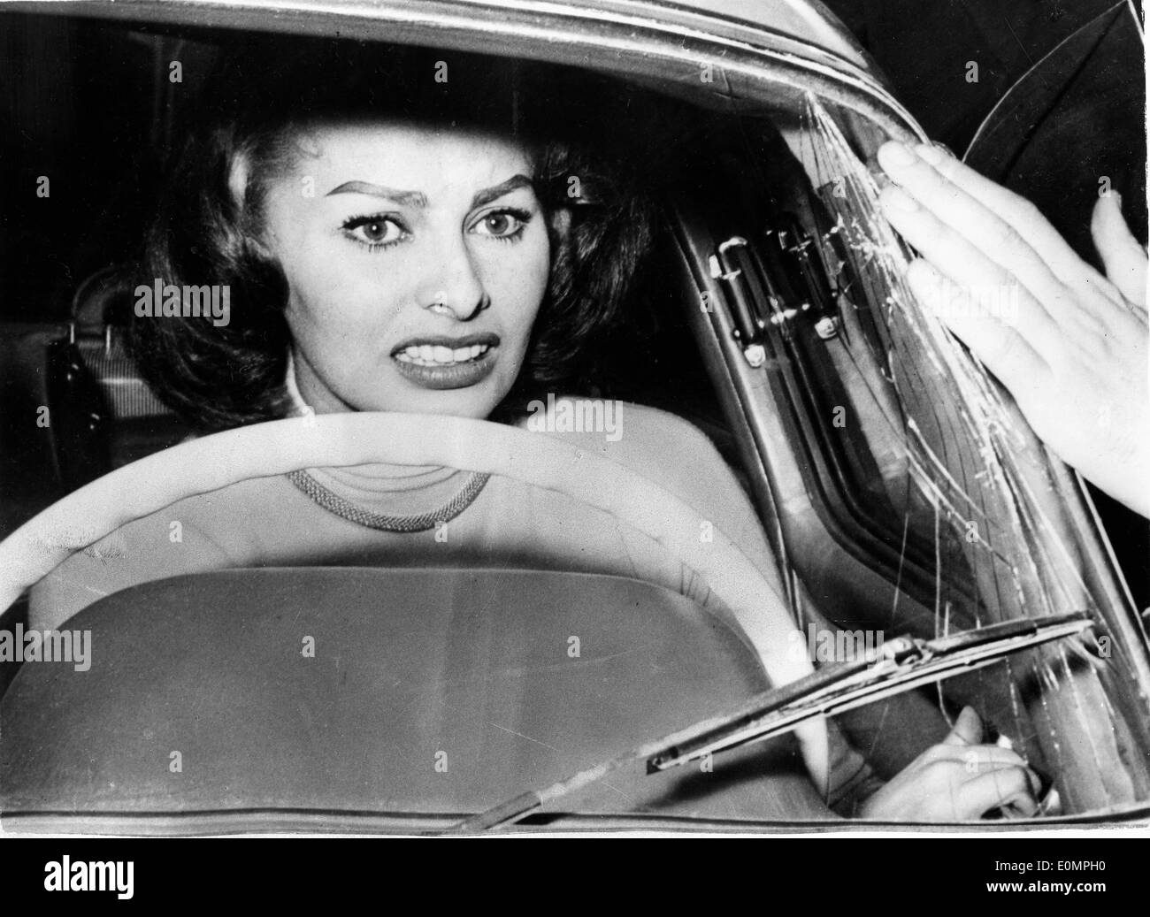 Actress Sophia Loren frightened after her windshield was cracked Stock Photo
