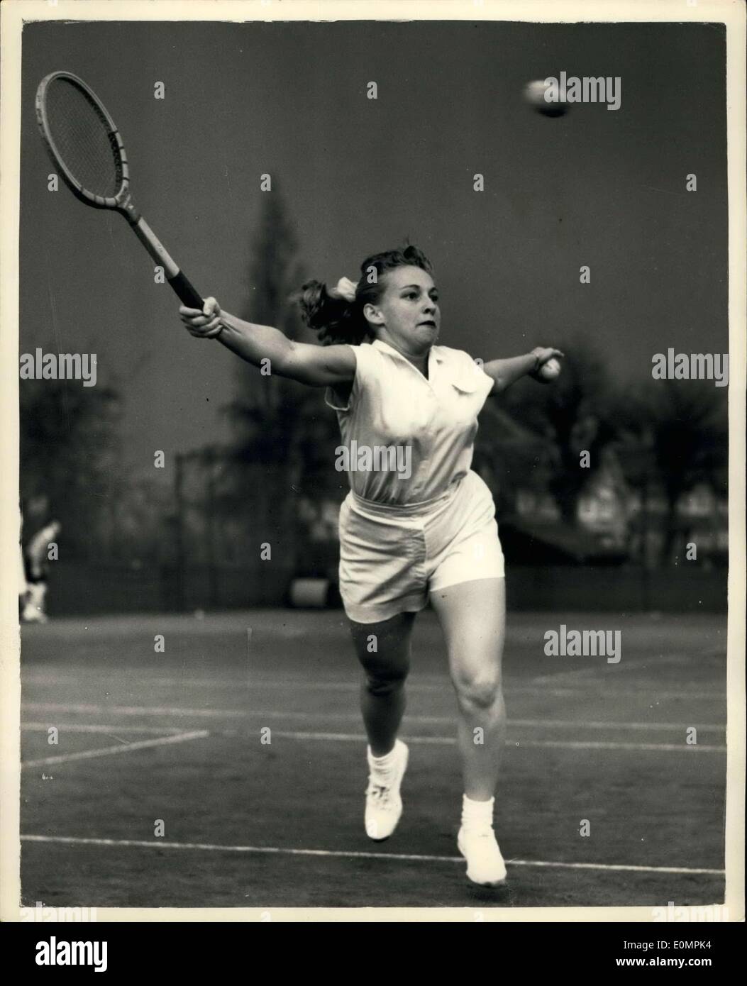 Apr. 17, 1956 - Sutt on hard courts tournament. Darlene hard takes part. The 20-year old American lawn tennis player, Darlene Hard, who arrived in London by air today - took part in the Sutton (Surrey) hard courts tournament. In her match against Miss Jill Rook, rain supped play after the first set, which Miss hard won. Photo shows Darlene Hard seen leaping for after-hand - during the game today. Stock Photo