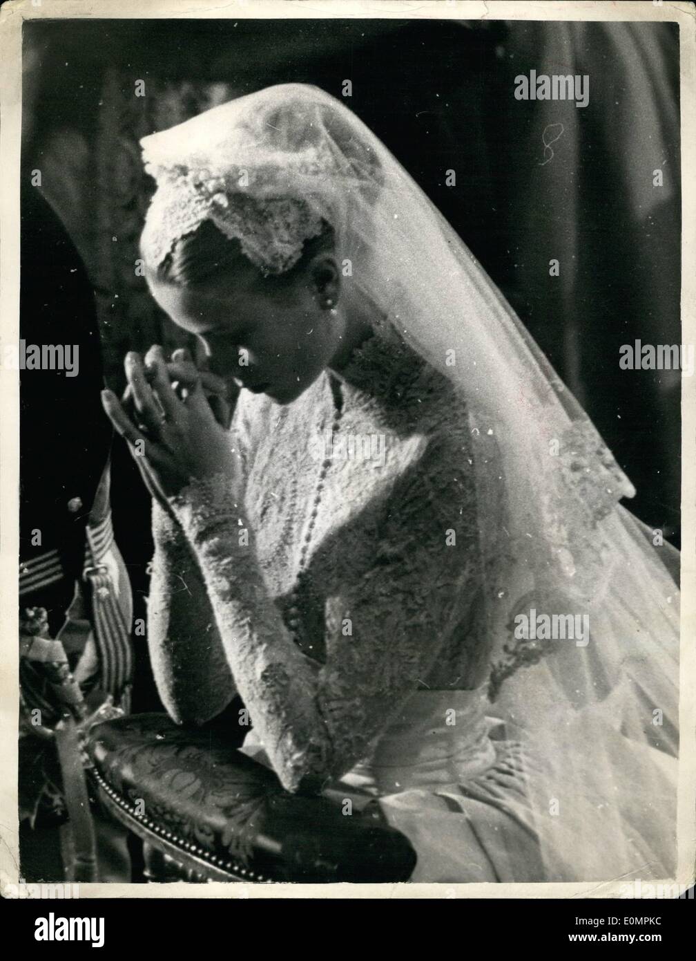 Apr. 19, 1956 - 19-4-56 Prince Rainier and Grace Kelly marry at Monaco Cathedral. Photo Shows: Princess Grace in prayer, a solemn moment in the religious ceremony. Stock Photo