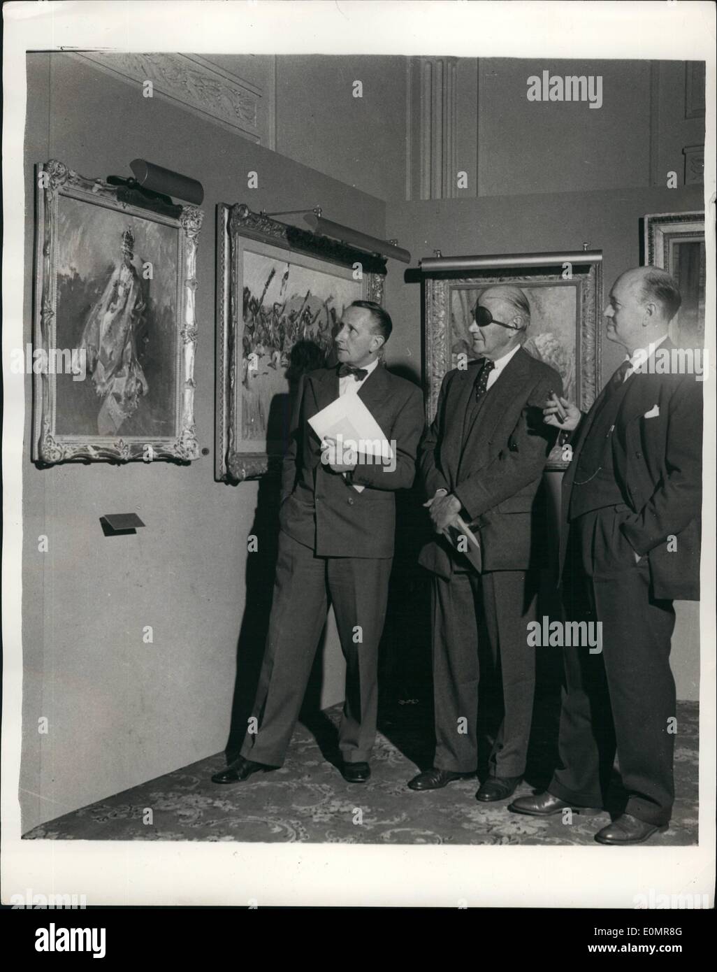 May 05, 1956 - Private vew of ''Pictures of an Industry'' Exhibition.: ''Picture of an Industry'' - an Exhibition of paintings by terence Cuneo, commissioned by the Inco-Mond Nickel Group of Companies, opens today at Grosvenor House. Photo shows (l to r): Terence Cuneo, the artist, showing his famous painting of H.N. The Queen wearing Coronation Crown - to Mr. Lewis Douglas, one time. U.S. Ambassador to Britain, and Mr. Henry S. Wingate, of New York, U.S.A., at yesterday's private view of the exhibition. Stock Photo